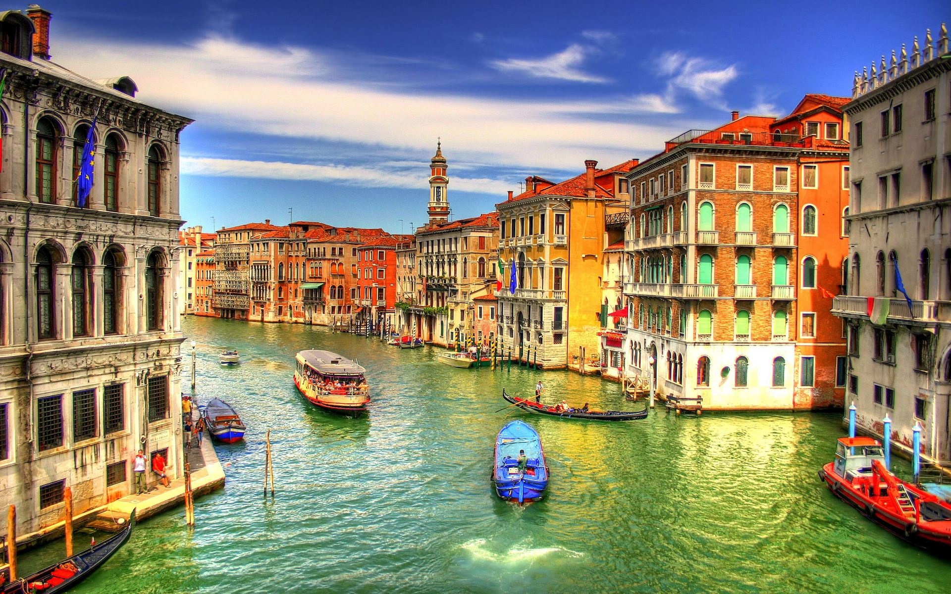 Venice: Boats and gondolas being the primary mode of travel through the city's canals. 1920x1200 HD Background.
