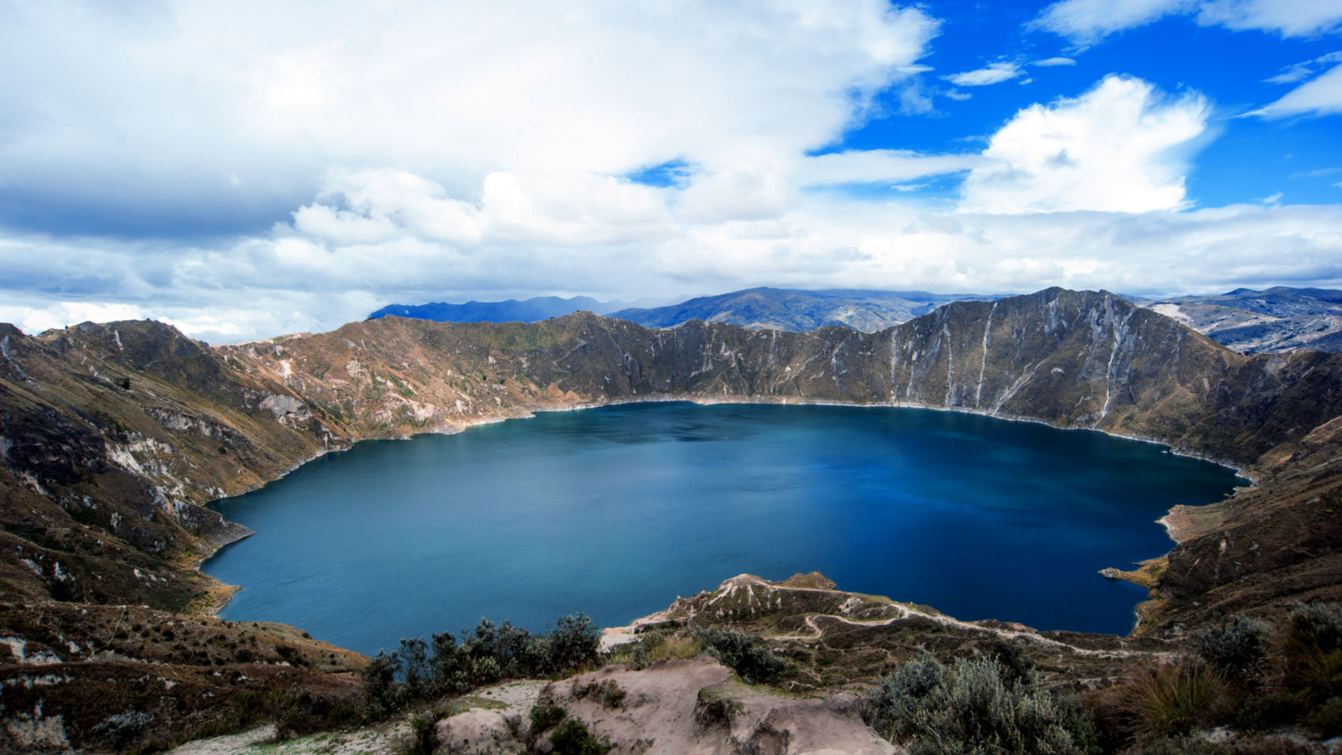 Ecuador: Quilotoa, a water-filled crater lake and the most western volcano in the Ecuadorian Andes. 1920x1080 Full HD Background.