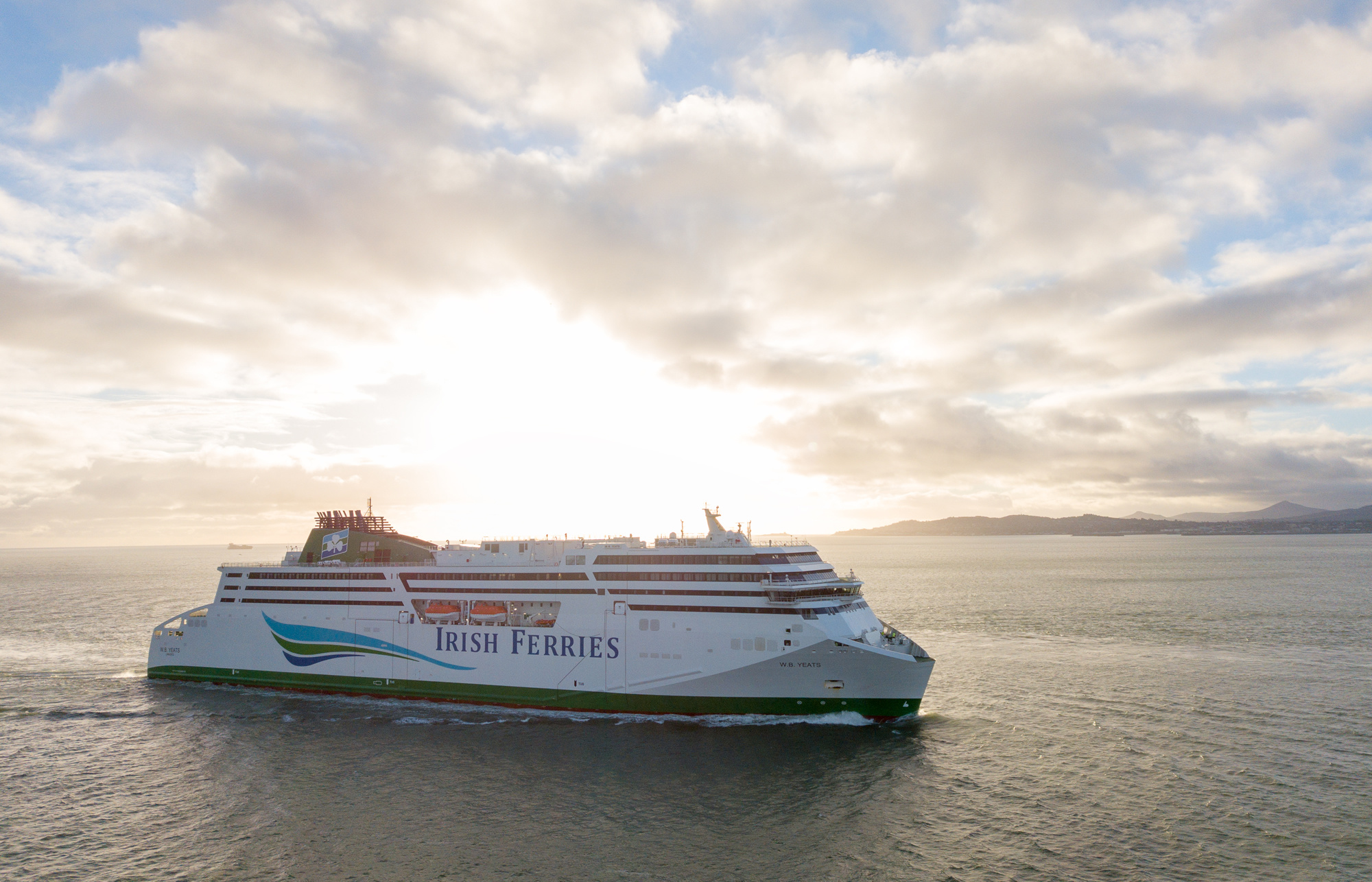 Ferry: A ship that makes a voyage of short distance between two places. 2000x1290 HD Wallpaper.