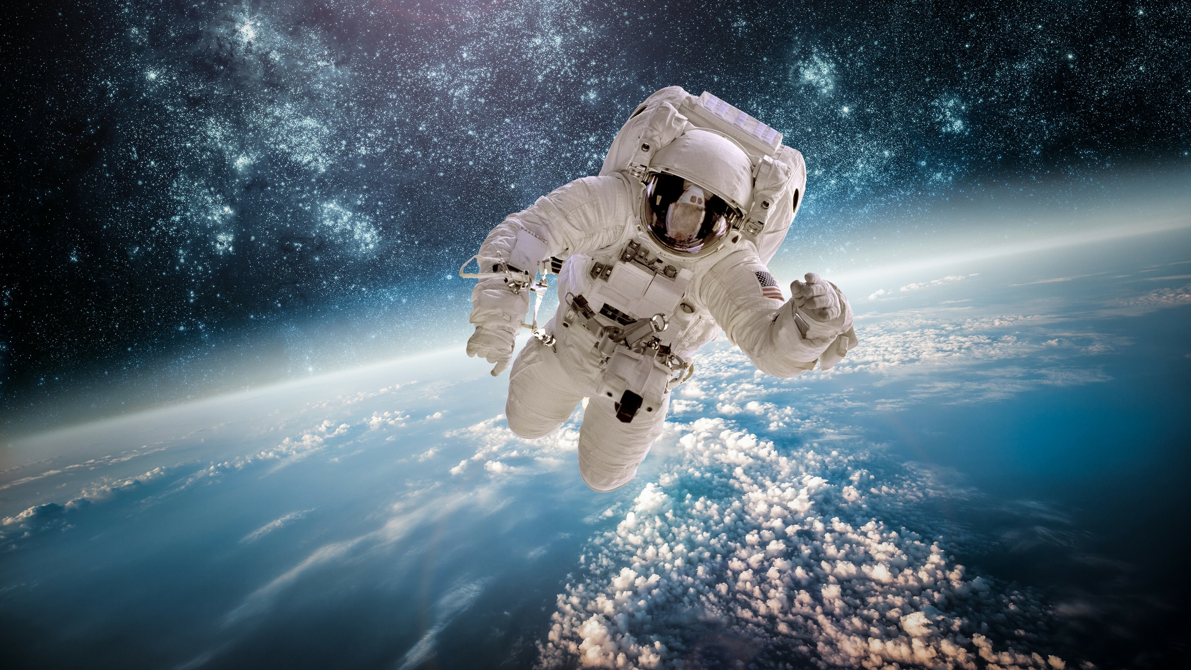 Astronaut: Anyone who travels into space, A Manned Maneuvering Unit. 3840x2160 4K Background.