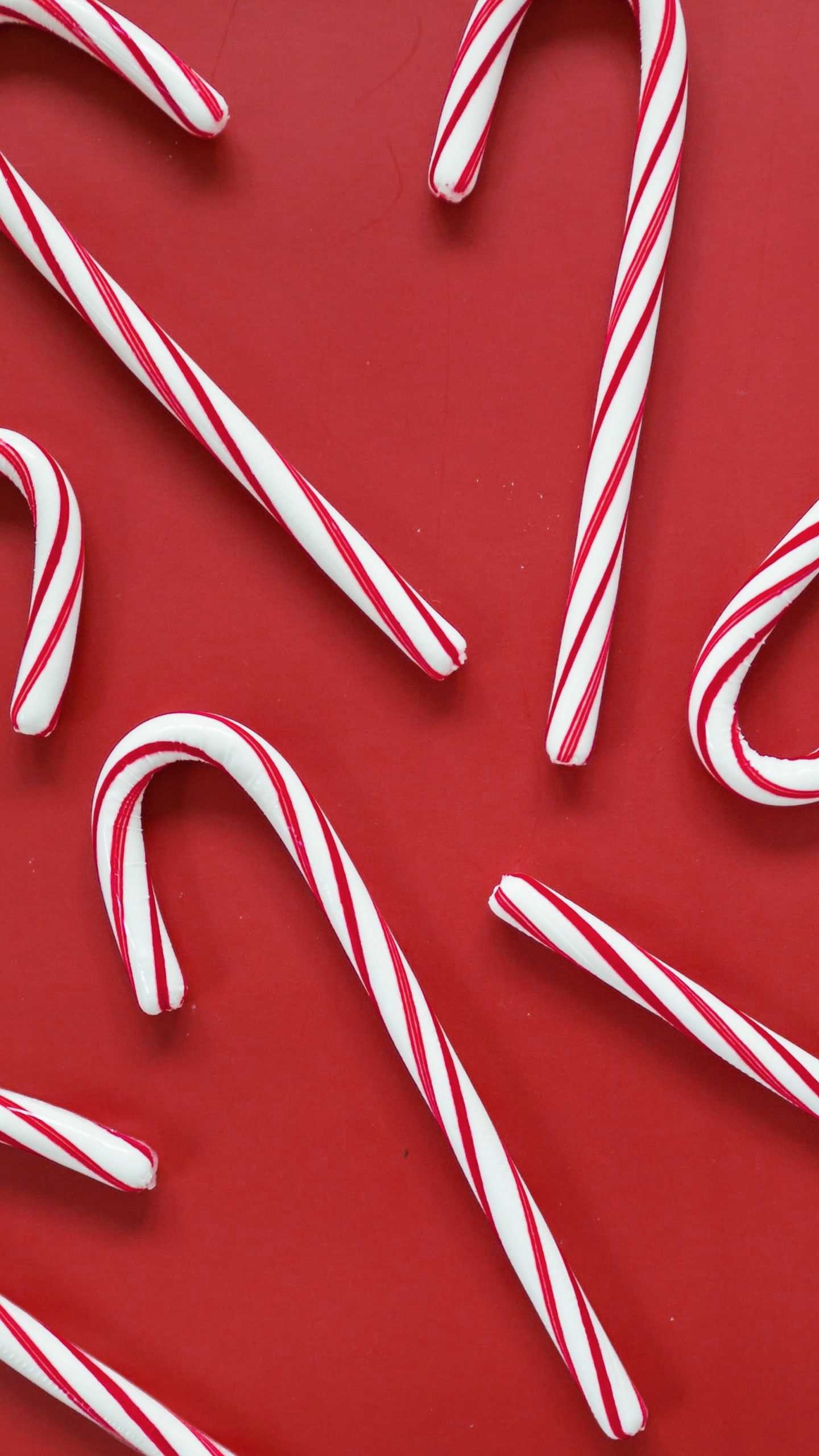Candy cane background, Festive design, Sweet delight, Holiday spirit, 1440x2560 HD Handy