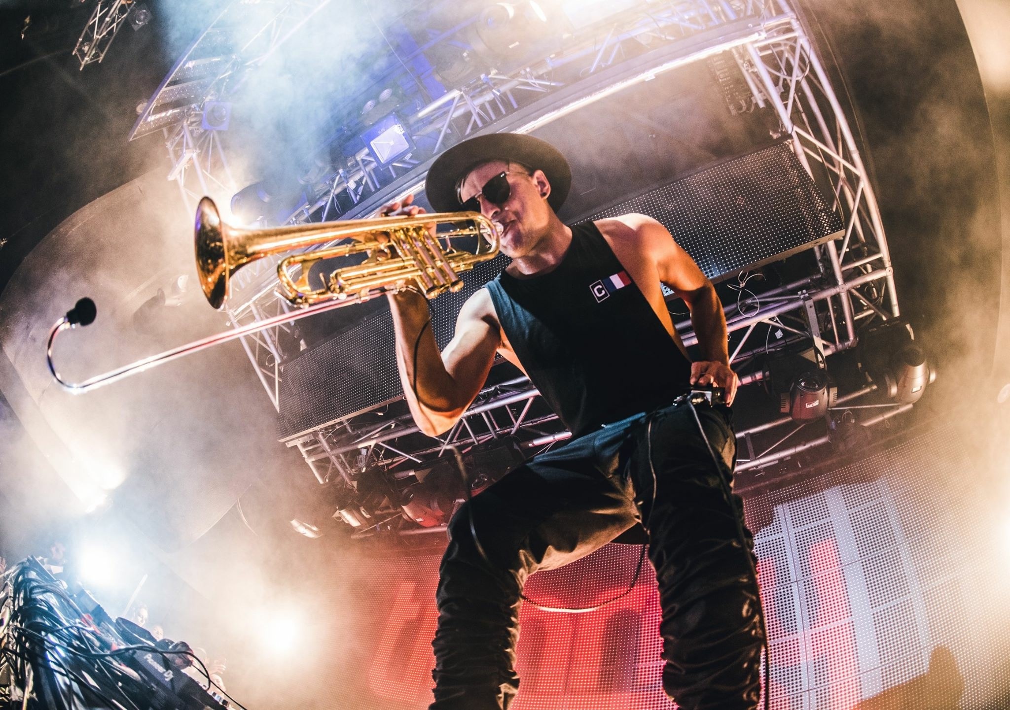 Trumpet: Timmy Trumpet performance, Multi-platinum DJ, producer and live instrumentalist, World summer tour. 2050x1450 HD Background.