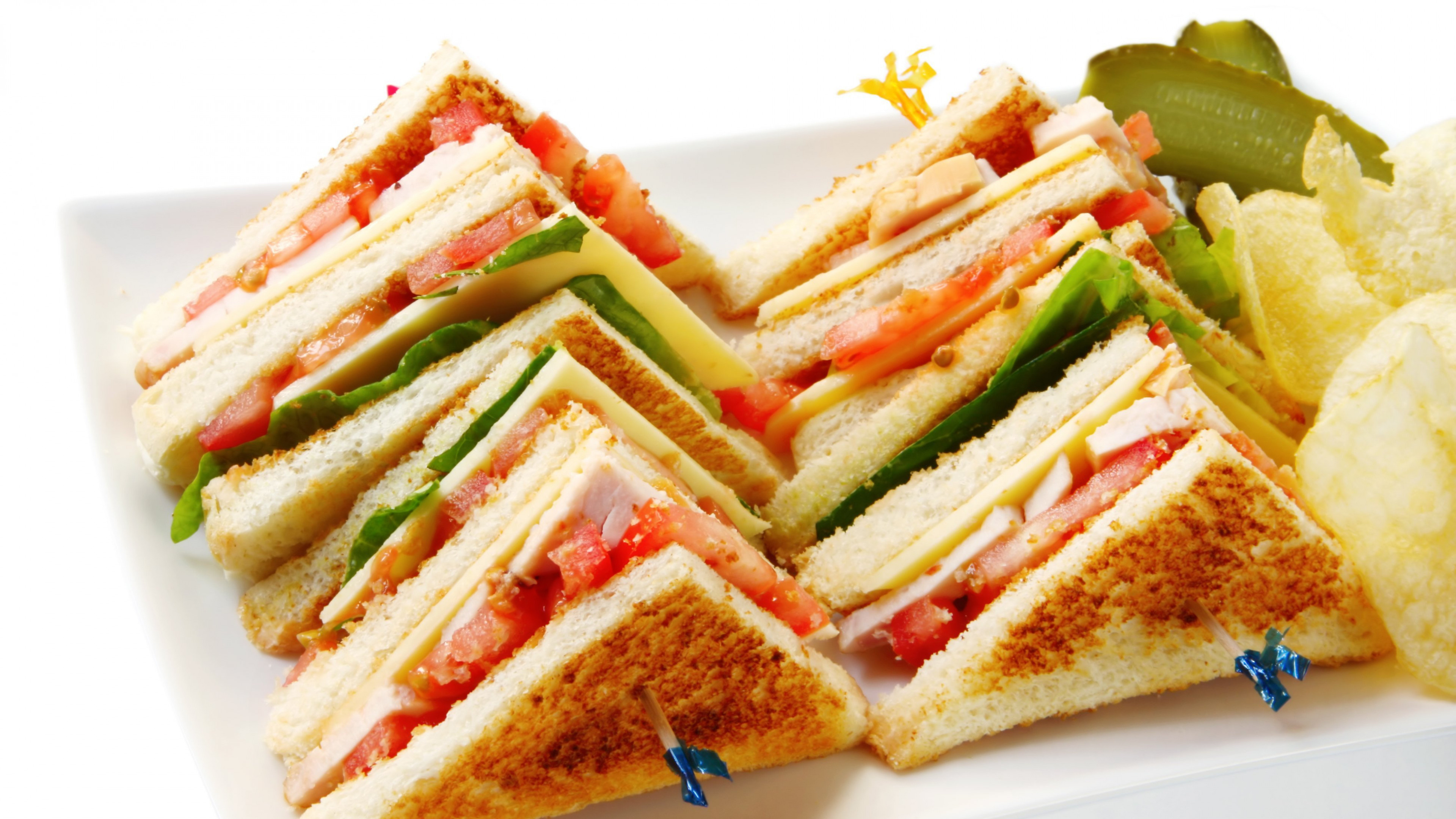 Sandwich: A dish wherein bread serves as a container or wrapper for another food type. 3840x2160 4K Background.