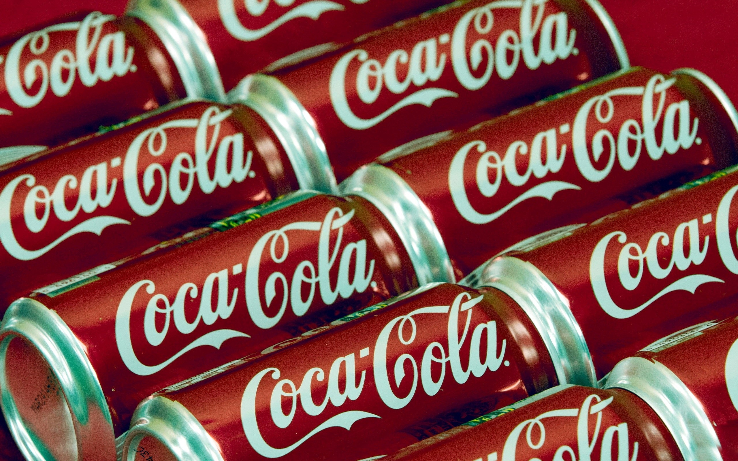 Coca-Cola: It was invented in the late 19th century by John Stith Pemberton in Atlanta, Georgia. 2560x1600 HD Background.