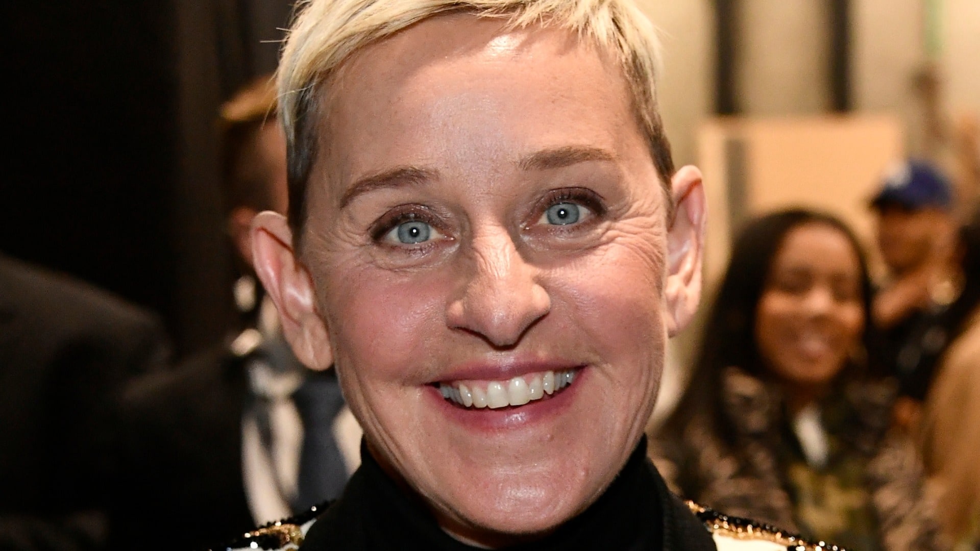 Ellen DeGeneres: An American talk show host, comedian, and actress. 1920x1080 Full HD Wallpaper.