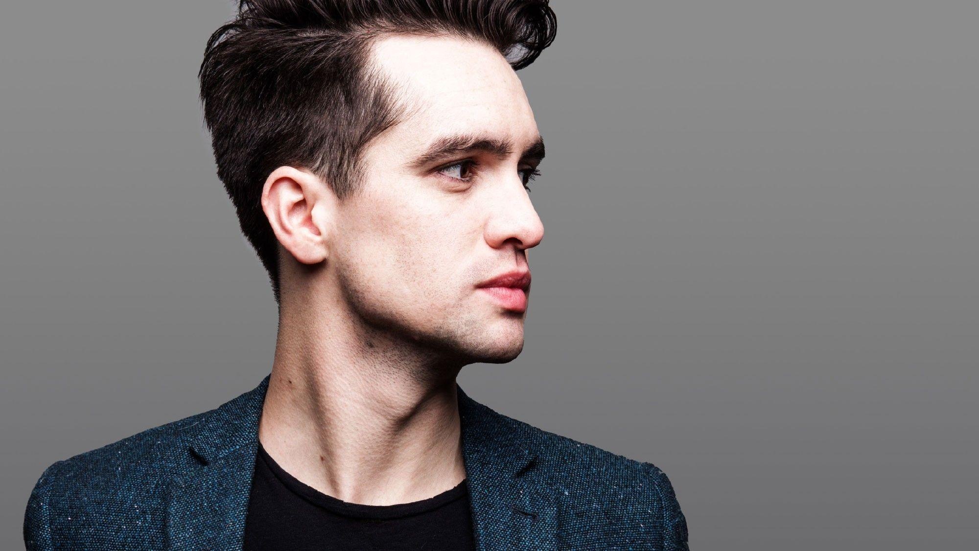 Brendon Urie: Former lead vocalist and frontman of Panic! at the Disco, The only member to stay throughout the band's 19-year run. 2000x1130 HD Wallpaper.