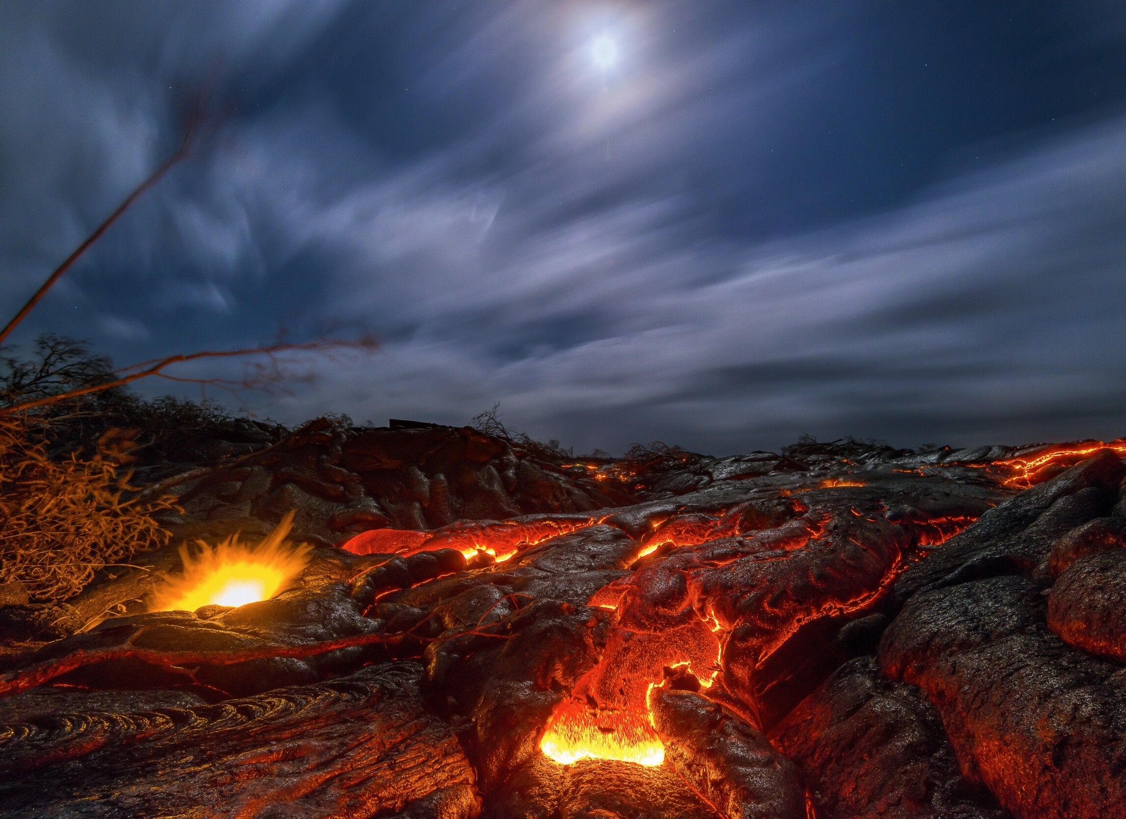 Geology: Lava, Molten rock that issues from a fissure in the surface of a planet. 2300x1670 HD Wallpaper.