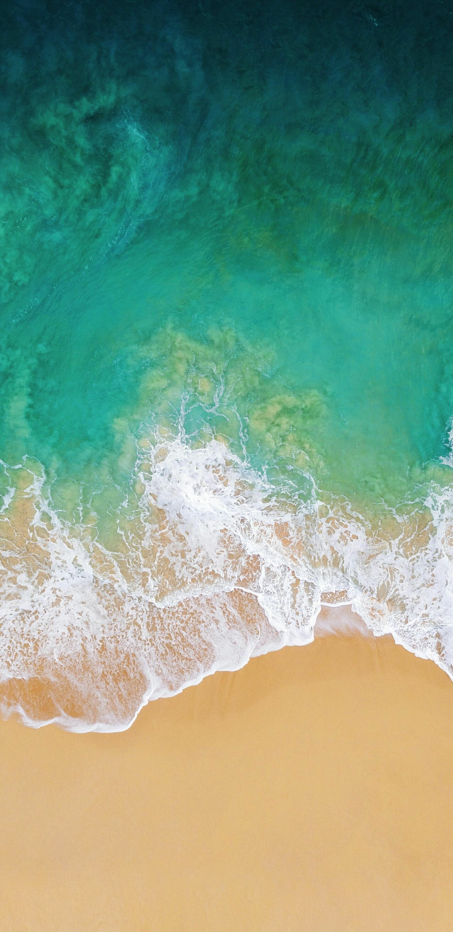 Ocean: Connected to smaller, adjoining bodies of water such as, seas, gulfs, bays, bights, and straits. 1870x3840 HD Background.