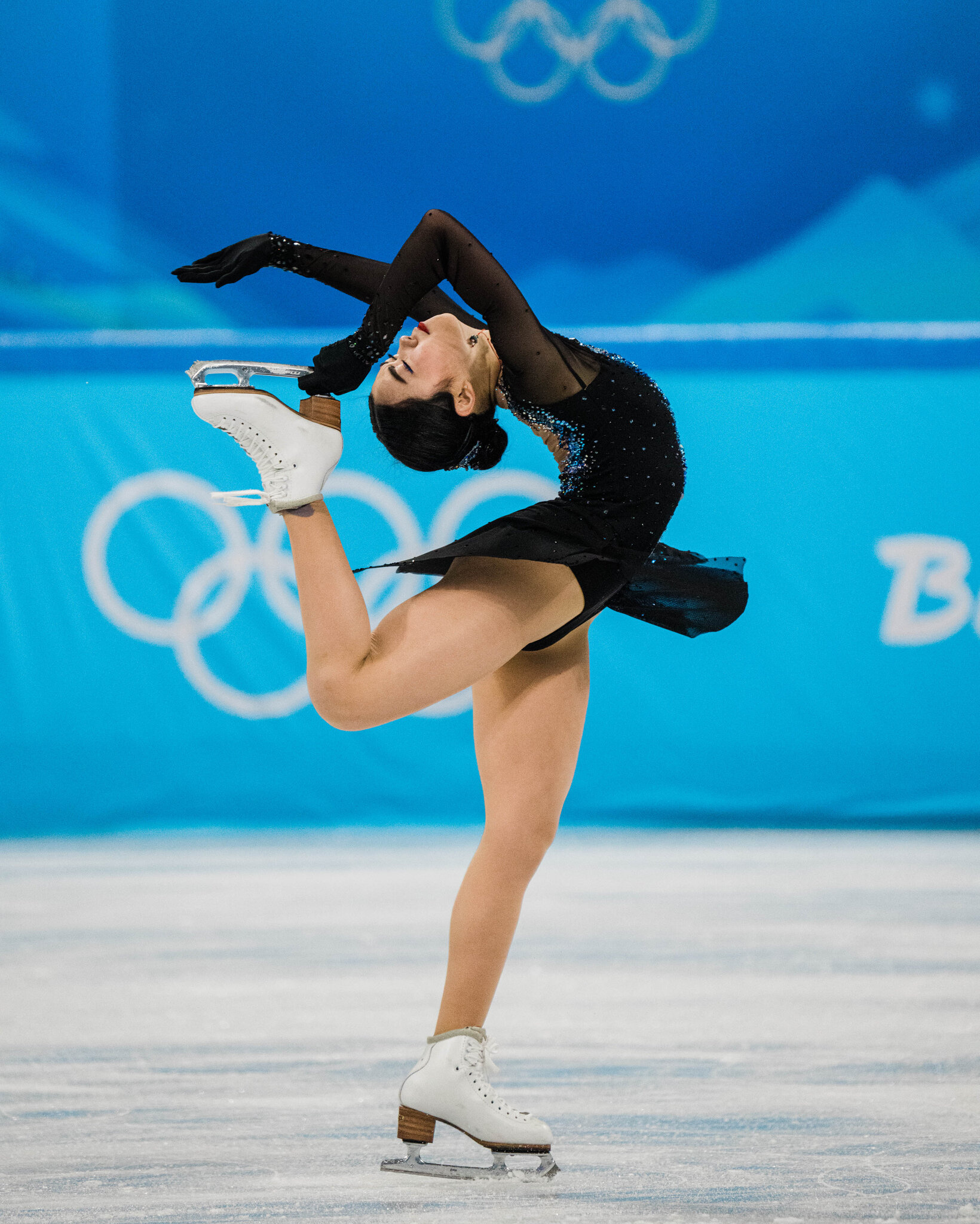 Single Skating: Zhu Yi at the 2022 Beijing Winter Olympic Games, Competitive sport. 1640x2050 HD Wallpaper.