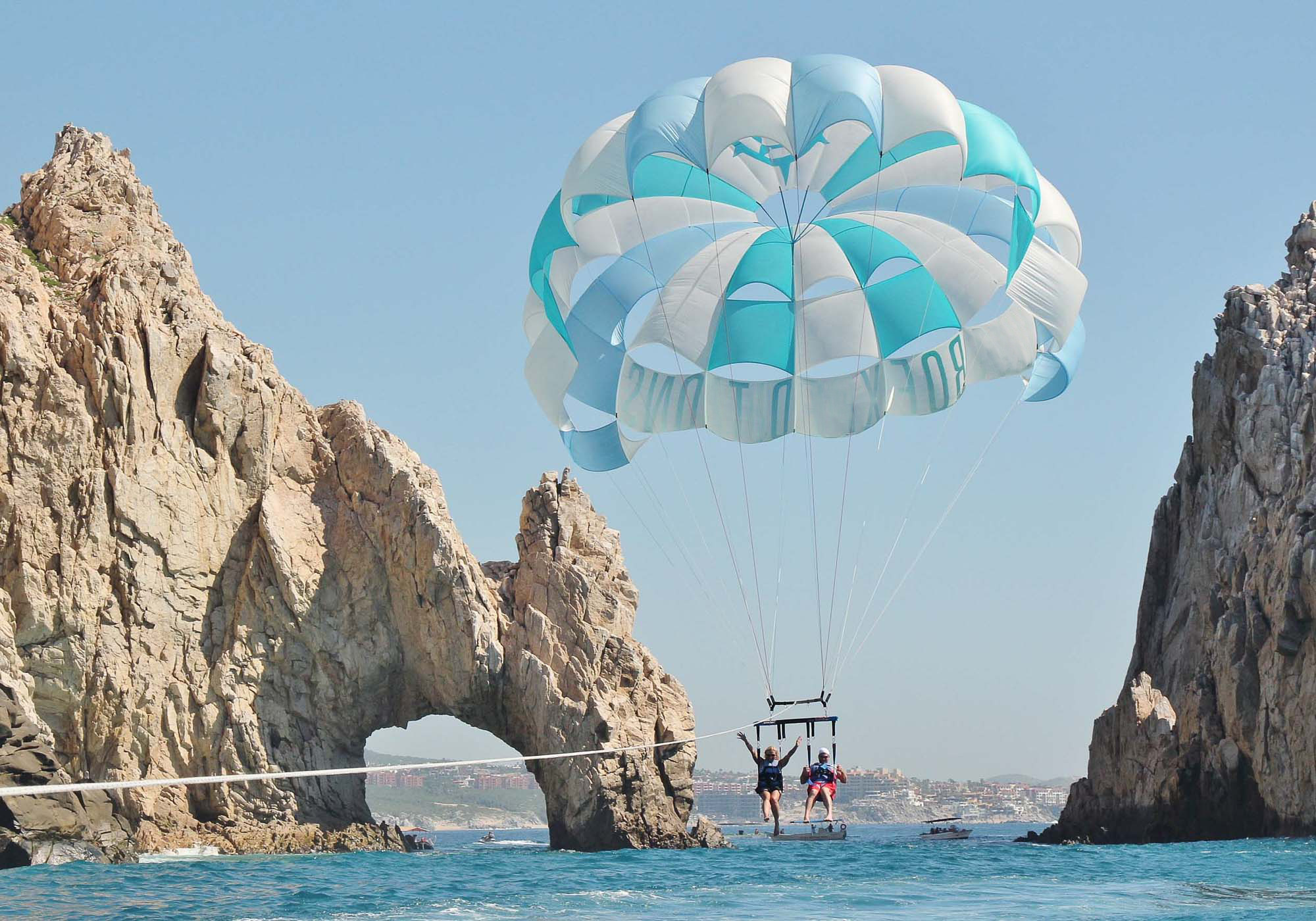 Parasailing: Cabo San Lucas, Water activities, The flyers take off upwards, Breathtaking views of the coastline, Los Cabos. 2000x1400 HD Wallpaper.