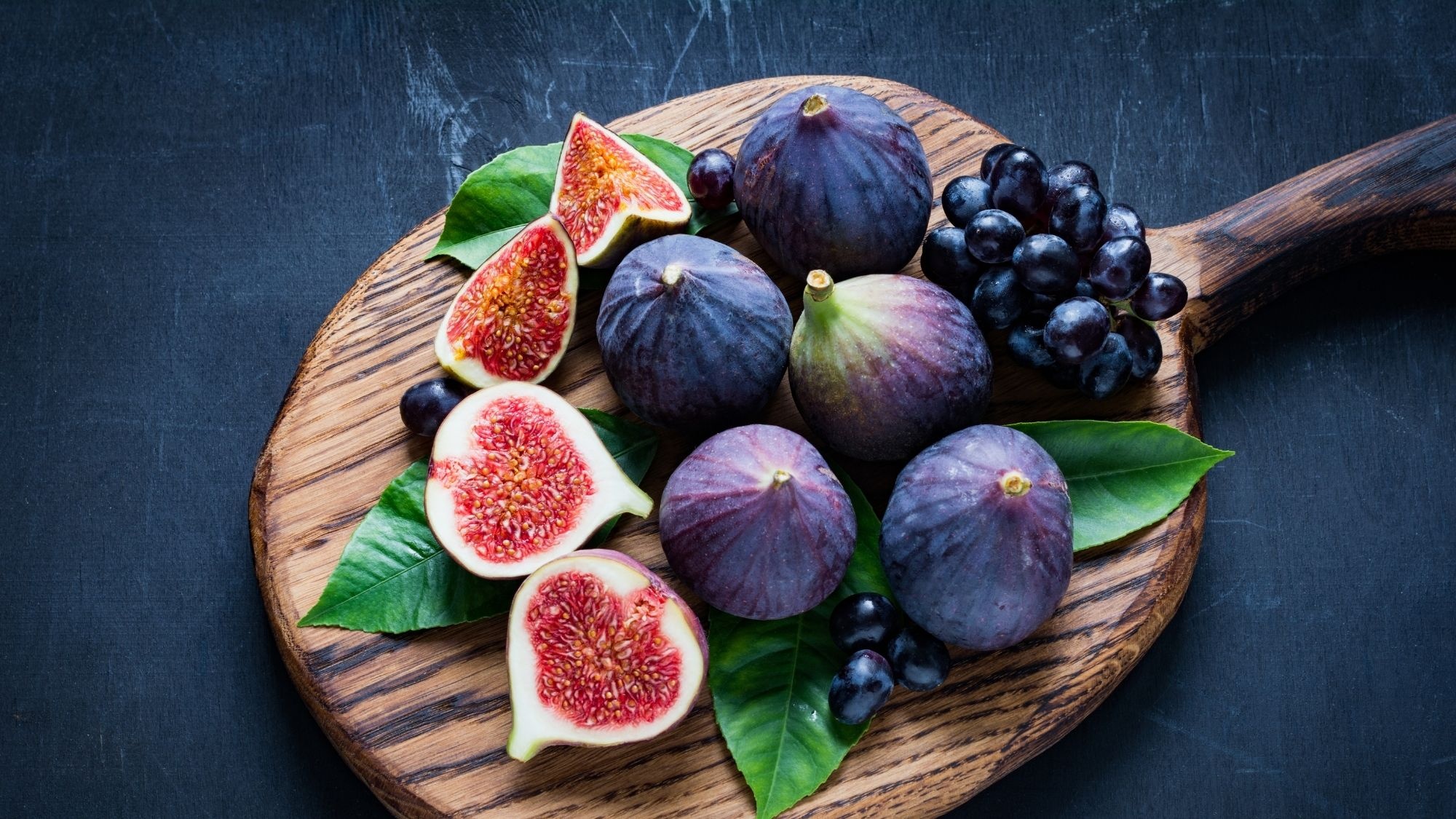 Fig: A rich source of dietetic fiber, potassium, proteins, minerals, and vitamins. 2000x1130 HD Background.
