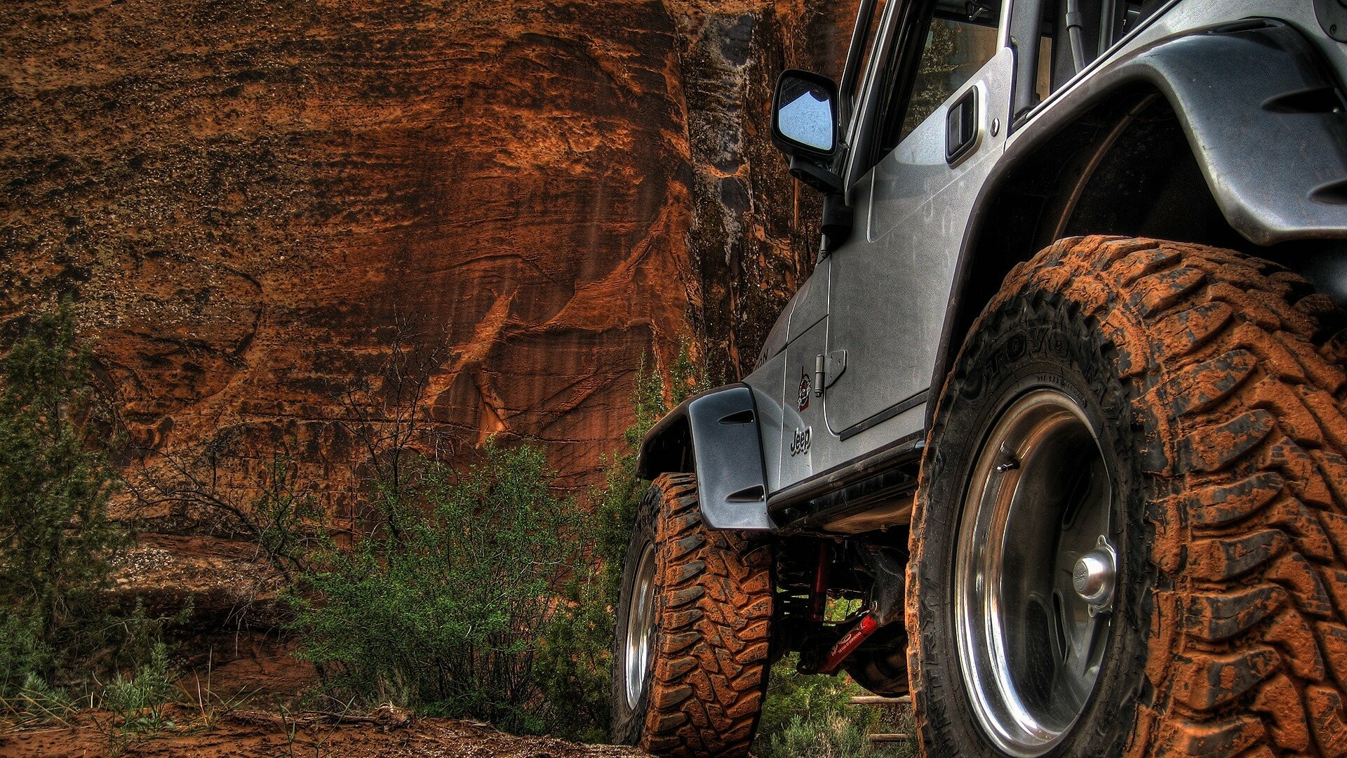 Jeep: Jeeps were the first mass-produced four-door car, thus beginning the age of SUVs. 1920x1080 Full HD Background.