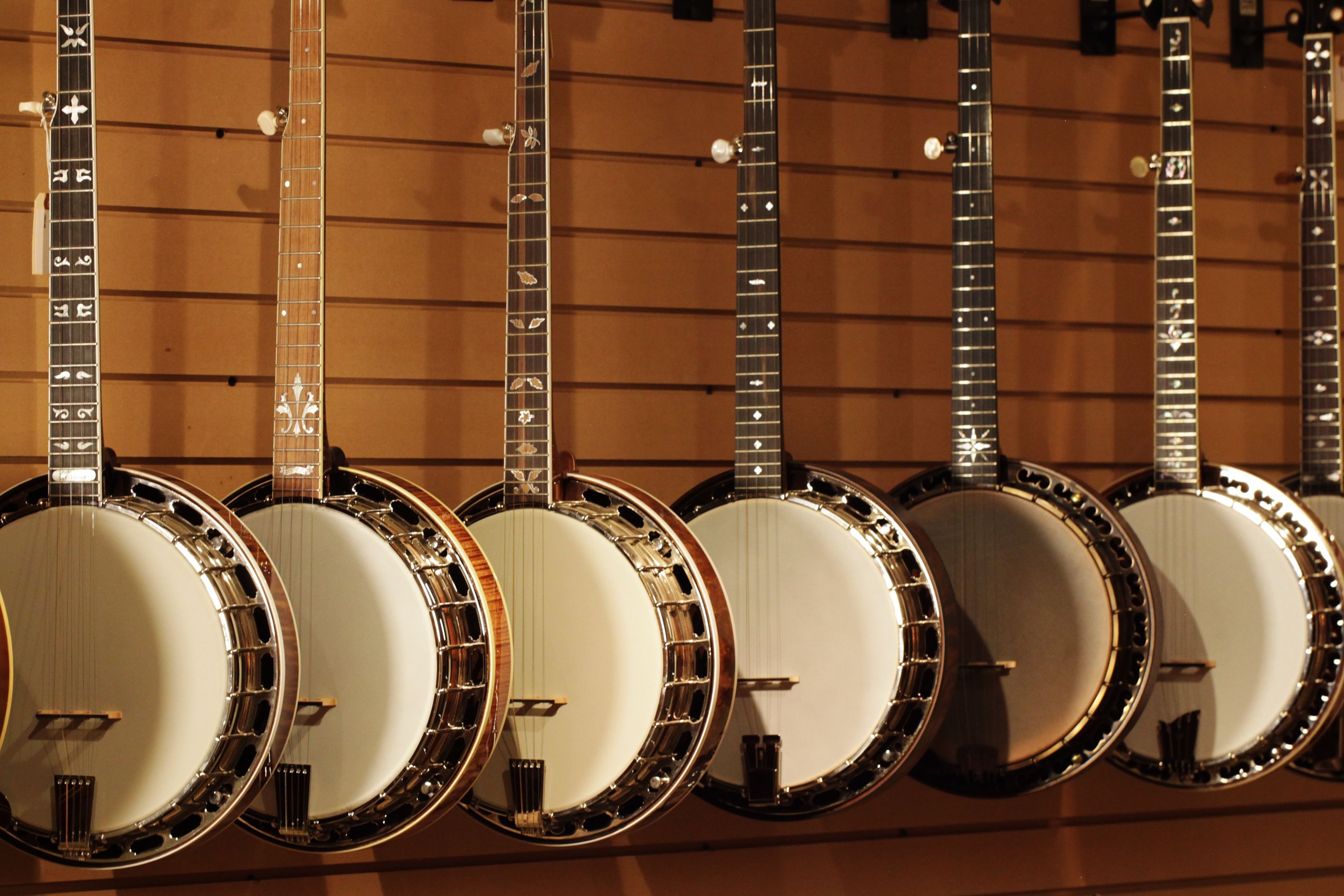 Banjo: A musical instrument with four or five strings and a body like a drum, Folk instruments. 3000x2000 HD Background.