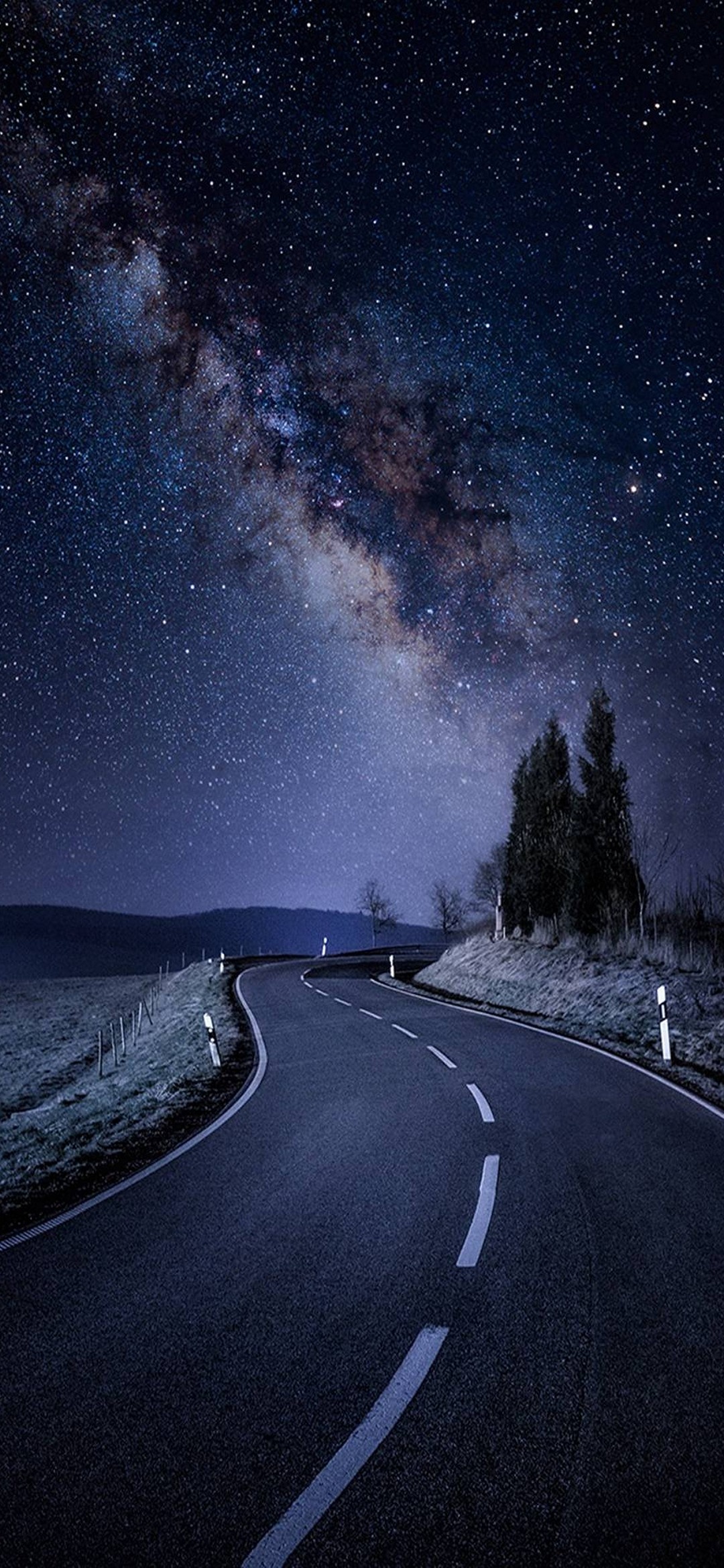 Landscape: The Milky Way, A sky full of stars at night, A perfect European road. 1080x2340 HD Background.