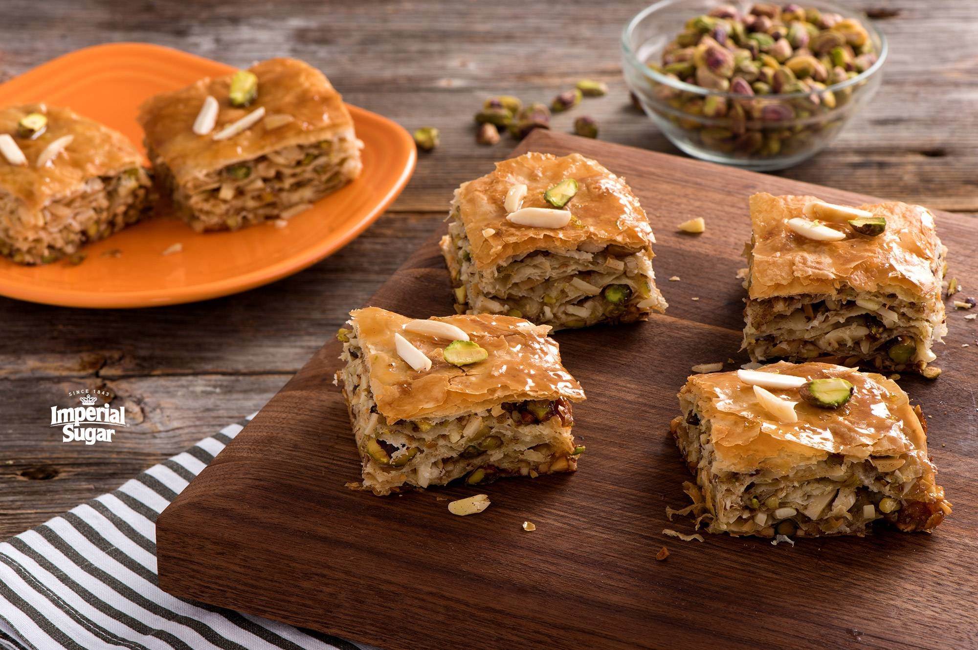 Baklava: The distinctive crispy texture on the outside and a soft, nutty filling on the inside. 2000x1330 HD Background.