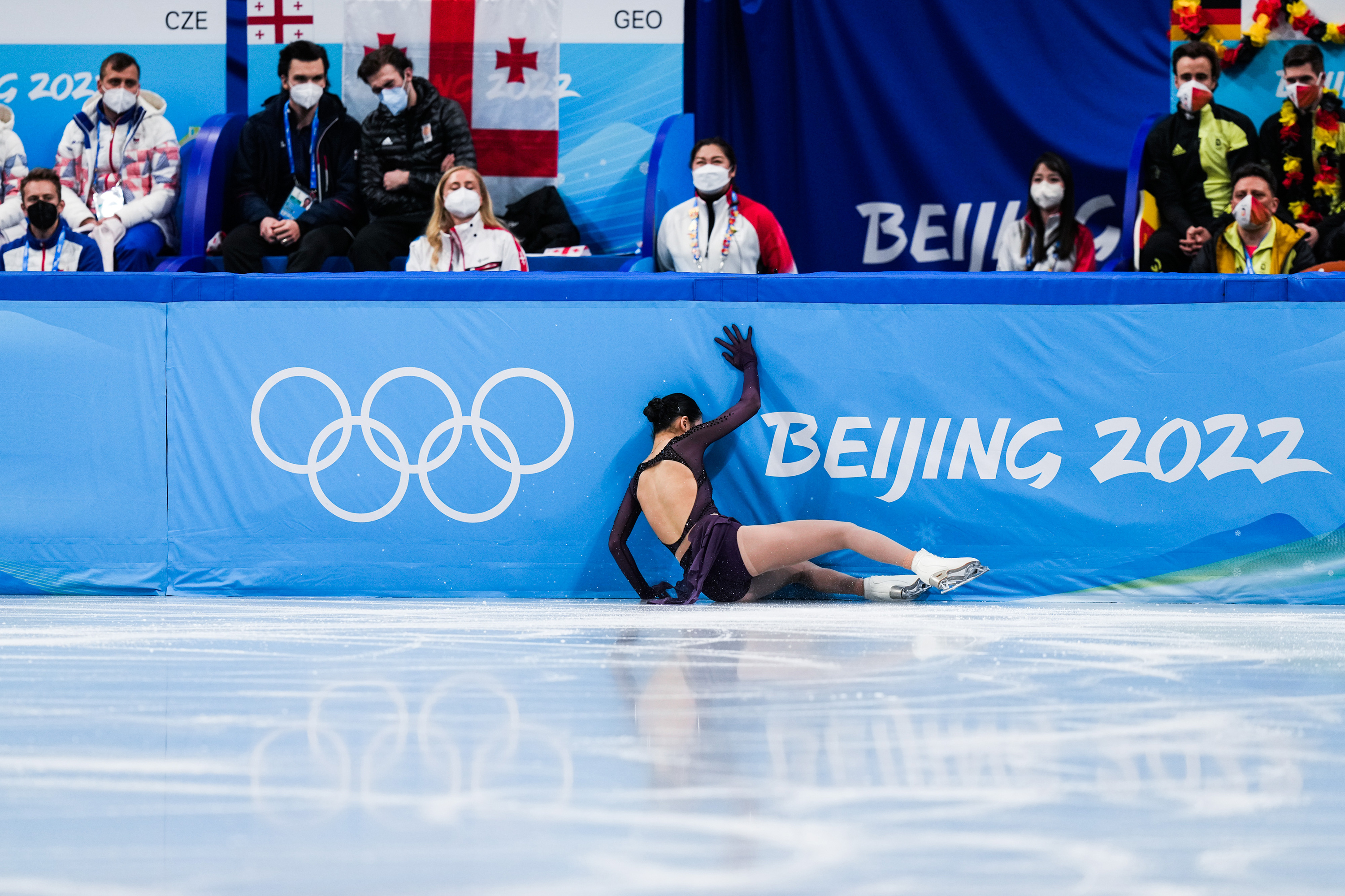 Single Skating: Zhu Yi, An American-born Chinese figure skater, A fall moment at the Beijing 2022. 3000x2000 HD Background.