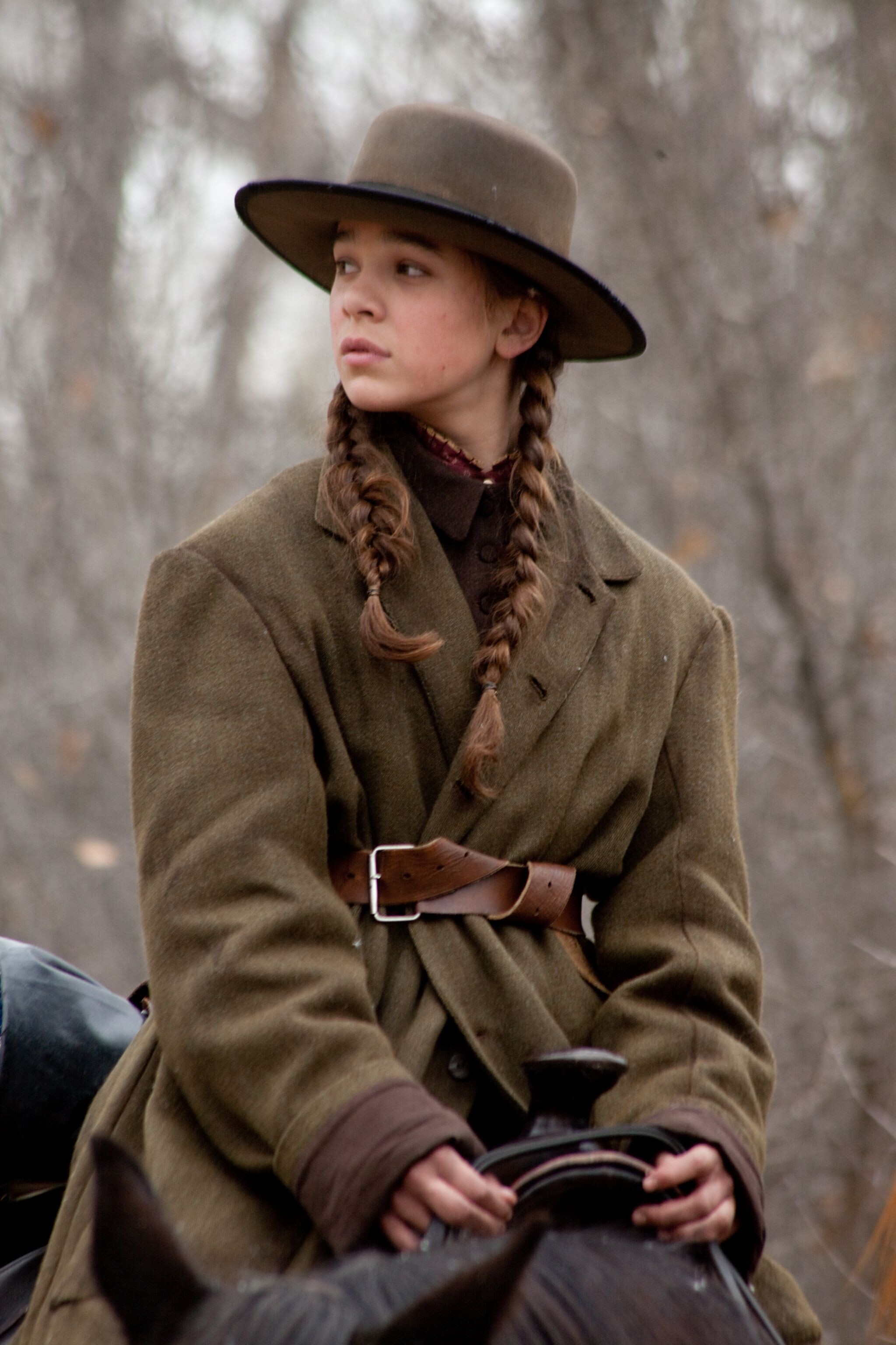 True Grit (Movie): Mattie Ross, A stubborn teenager, 14-year-old farm girl, Setting out to capture the killer. 2050x3080 HD Background.