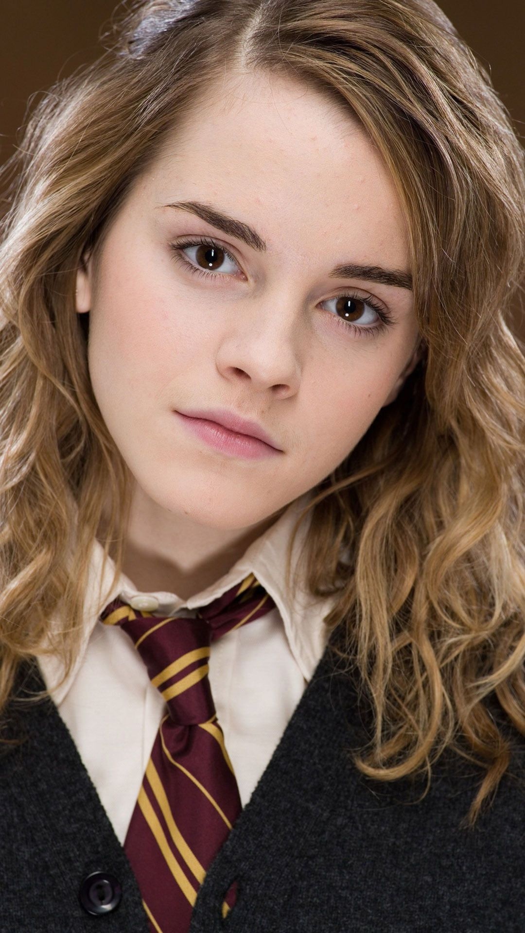 Hermione: Portrayed by Emma Watson in all eight Harry Potter films from Philosopher's Stone in 2001 to Deathly Hallows – Part 2 in 2011. 1080x1920 Full HD Wallpaper.