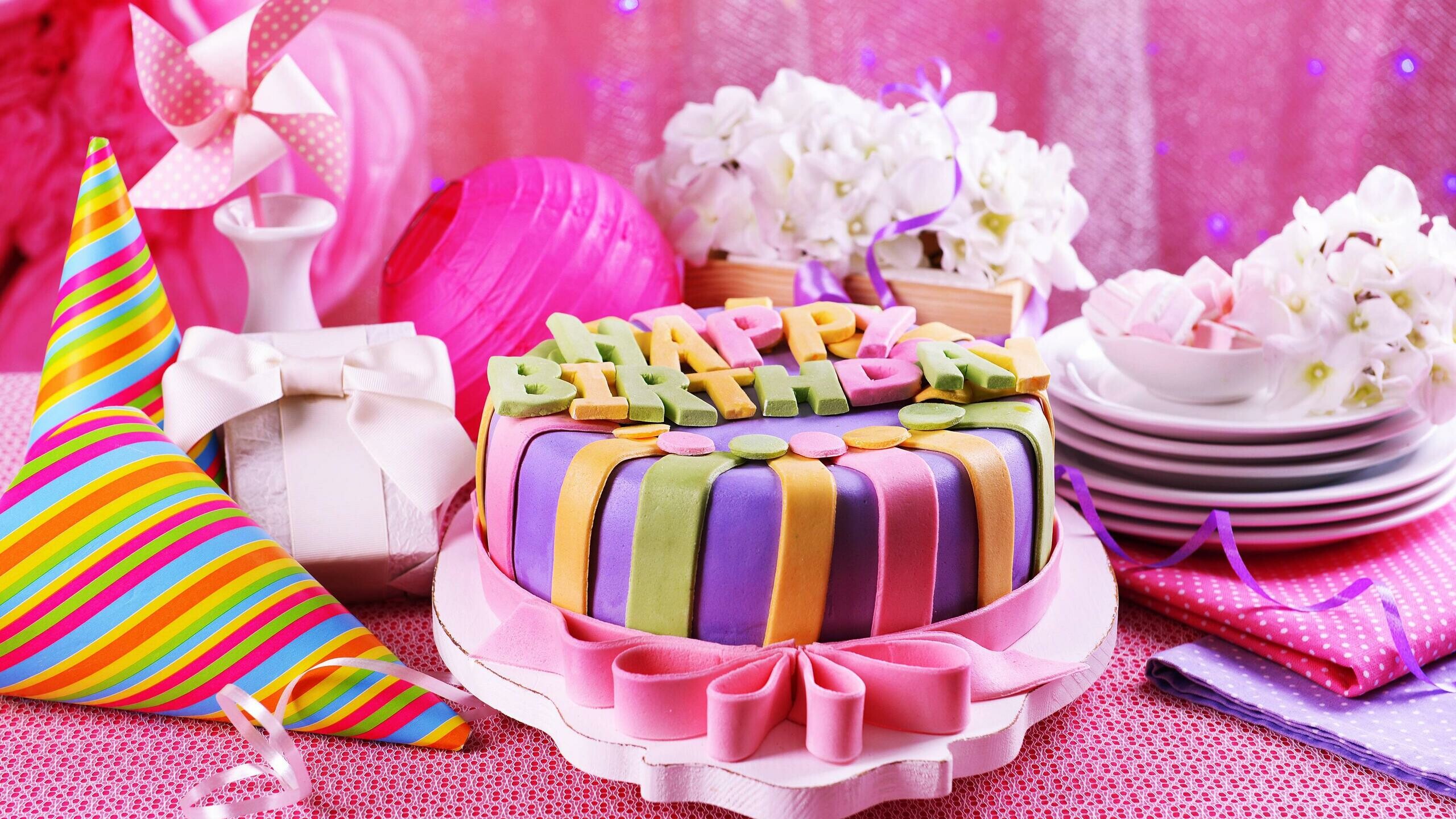 Birthday Party: A cake is eaten as part of a celebration. 2560x1440 HD Wallpaper.
