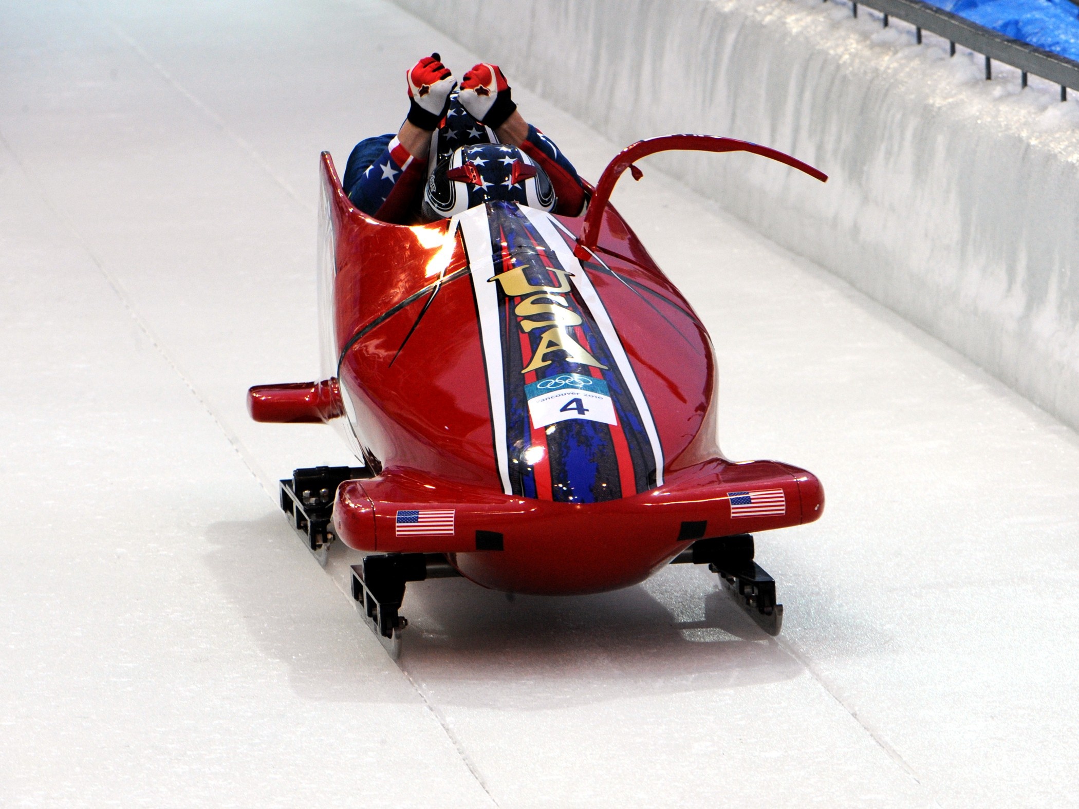 Bobsleigh: Michelle Rzepka and Shauna Rohbock during their third heat of the 2010 Olympic women's bobsled event. 2100x1580 HD Background.