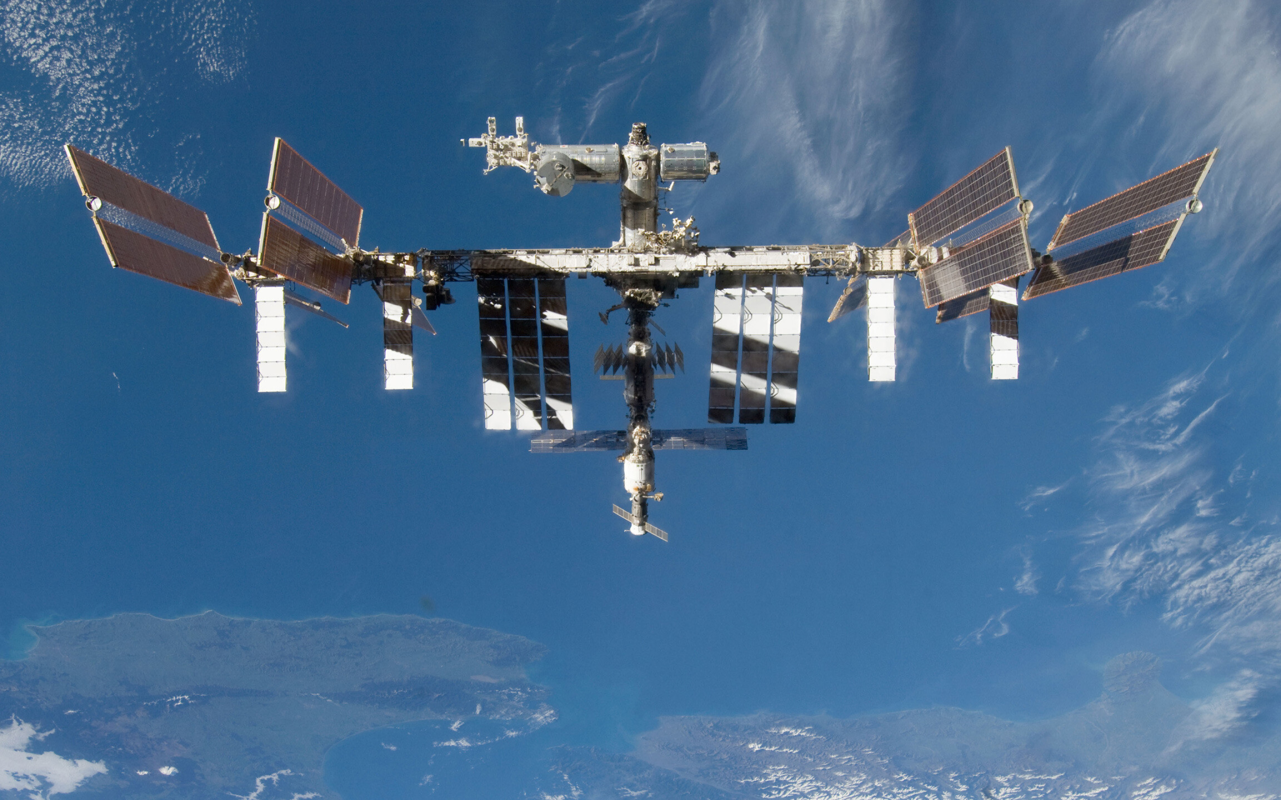 ISS: International Space Station, The Russian segment includes six modules. 2560x1600 HD Background.