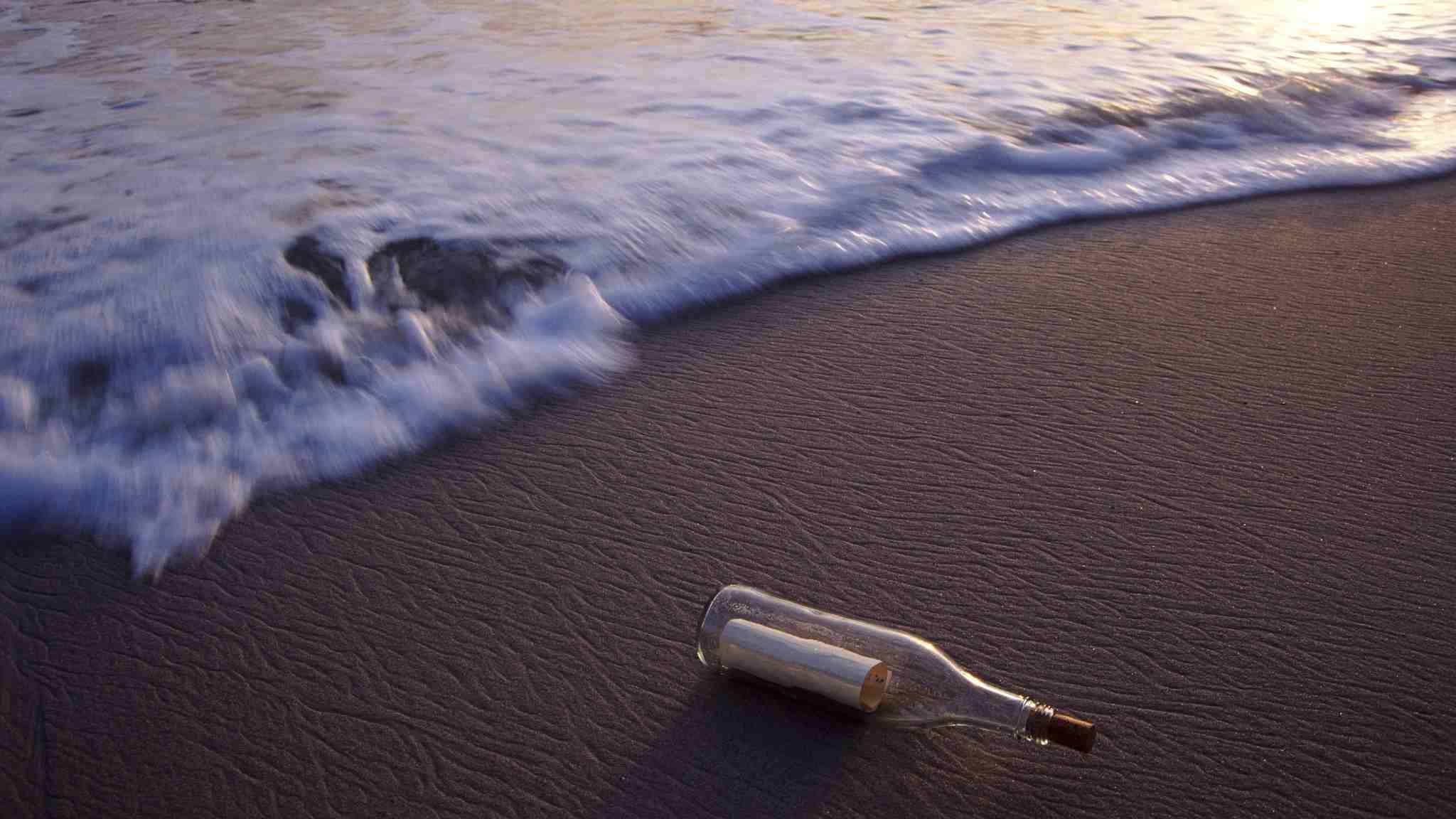 Message in a Bottle: The text could be anything from a declaration of love to a plea for help. 2050x1160 HD Background.
