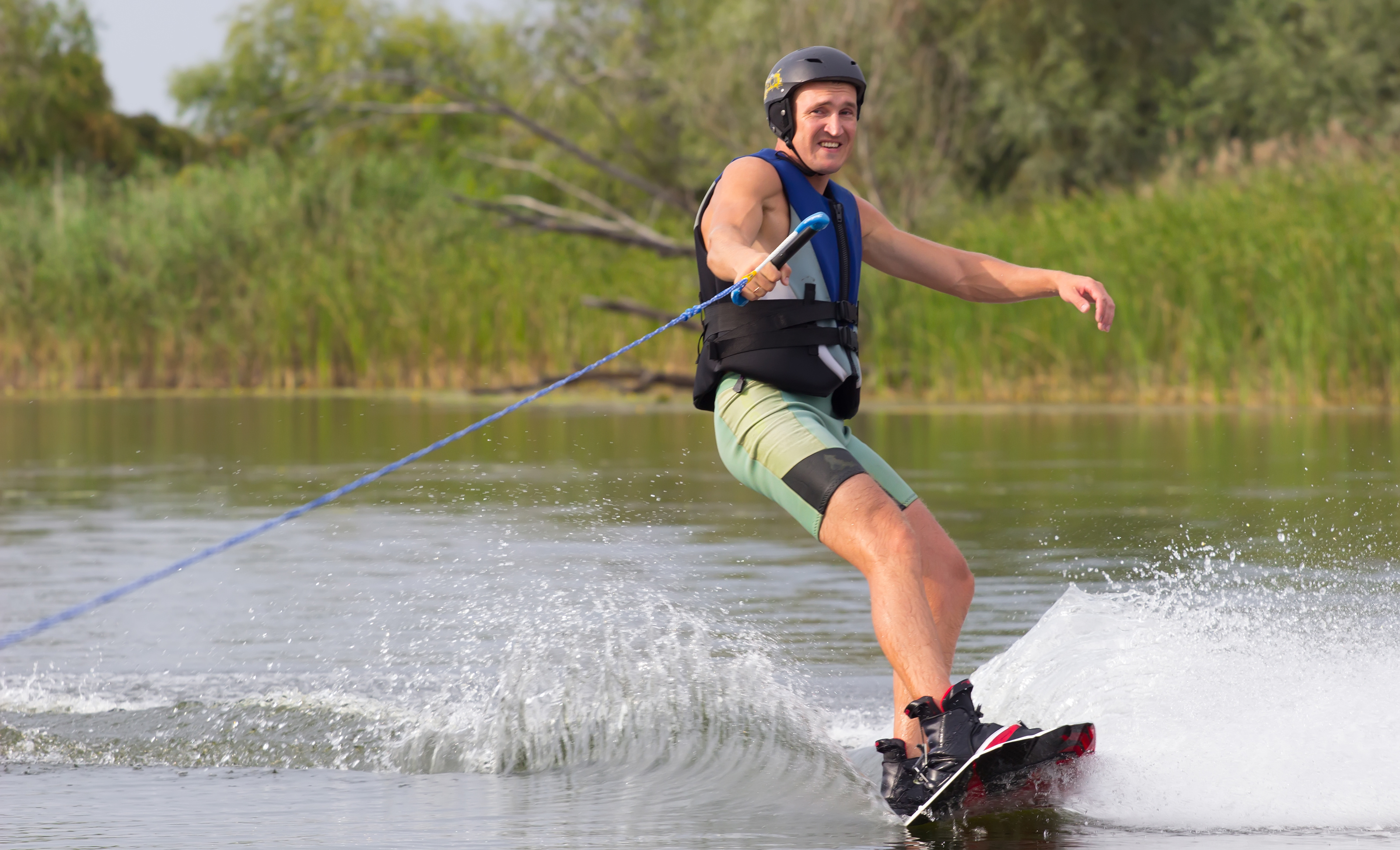 Wakeboarding: Freestyle wakeboarding in the river, Pleasure and competition water sports. 3200x1950 HD Background.