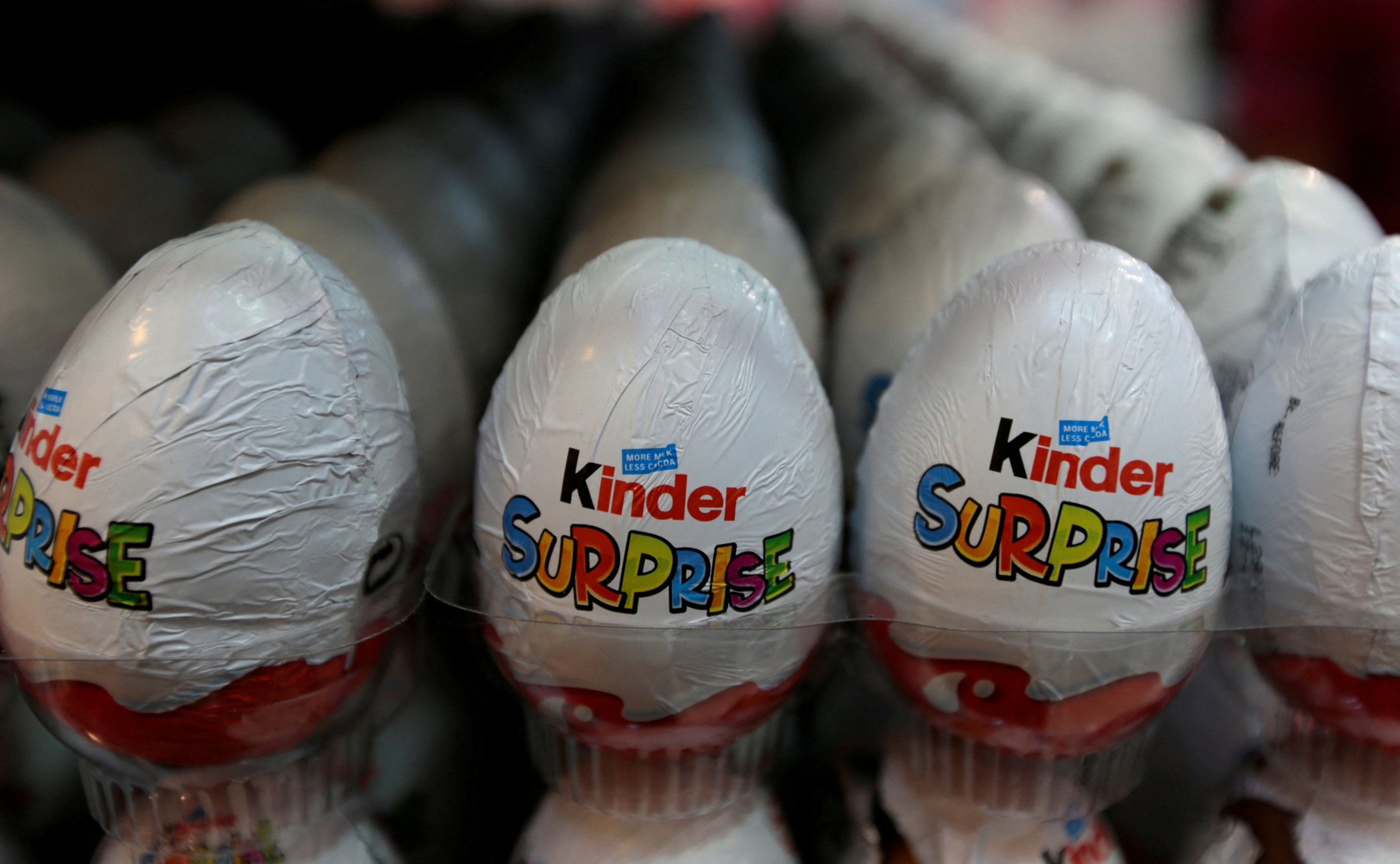Kinder (Brand): Kinder Surprise Egg, A chocolate egg surrounding a yellow plastic capsule. 3000x1860 HD Wallpaper.