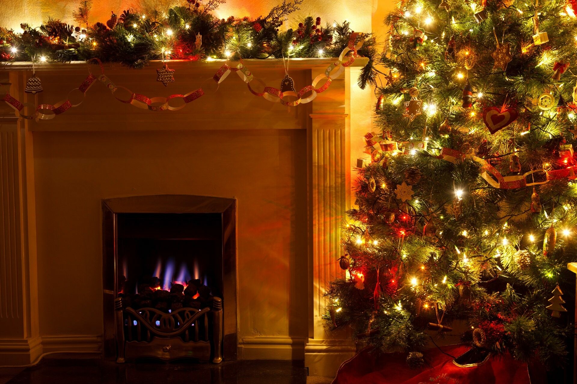 Christmas Fireplace: The spirit of giving, compassion, acceptance, presence, and presents. 1920x1280 HD Background.
