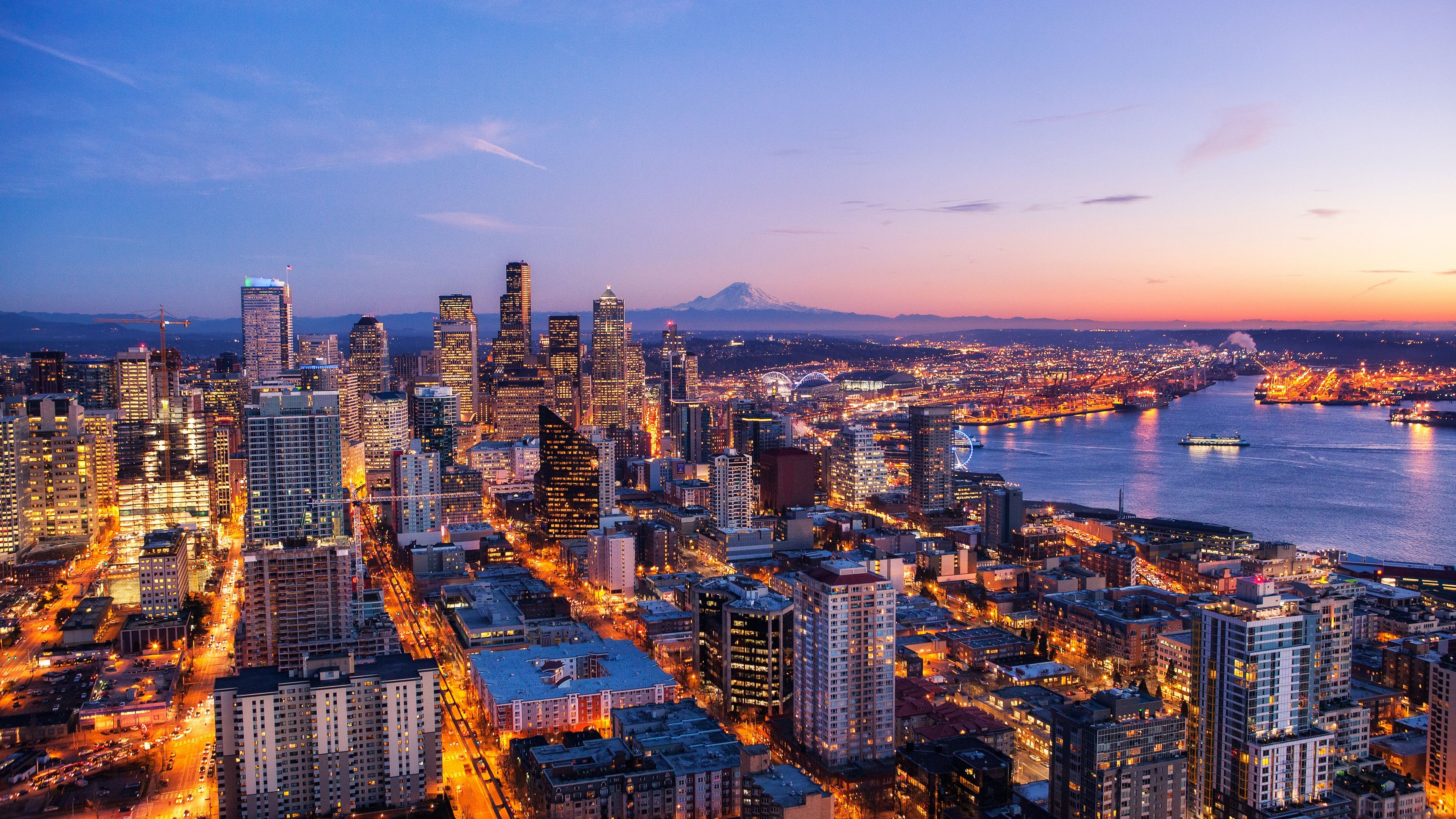 Skyline: A dusk time view of Seattle from the Space Needle observation tower, Washington State. 3840x2160 4K Wallpaper.