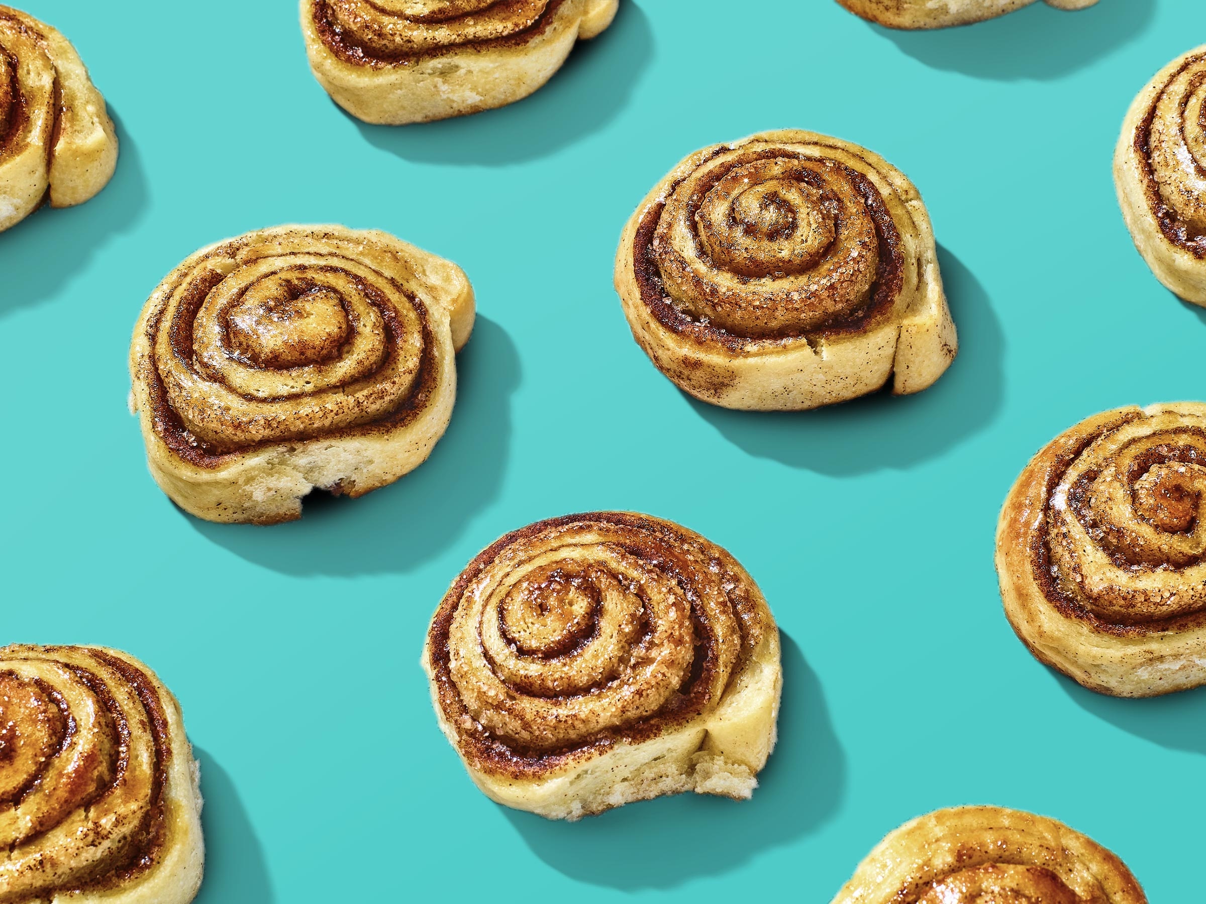 Cinnamon roll: Made from yeast dough topped with currants, brown sugar, and butter. 2400x1800 HD Background.