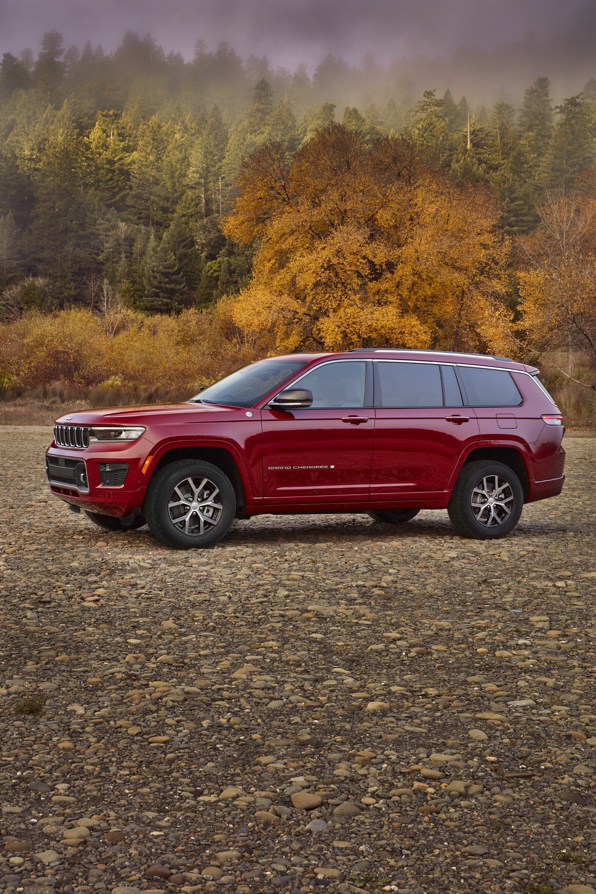 Jeep Grand Cherokee: Full size SUV, Three rows of seats for six or seven passengers. 2000x3000 HD Wallpaper.