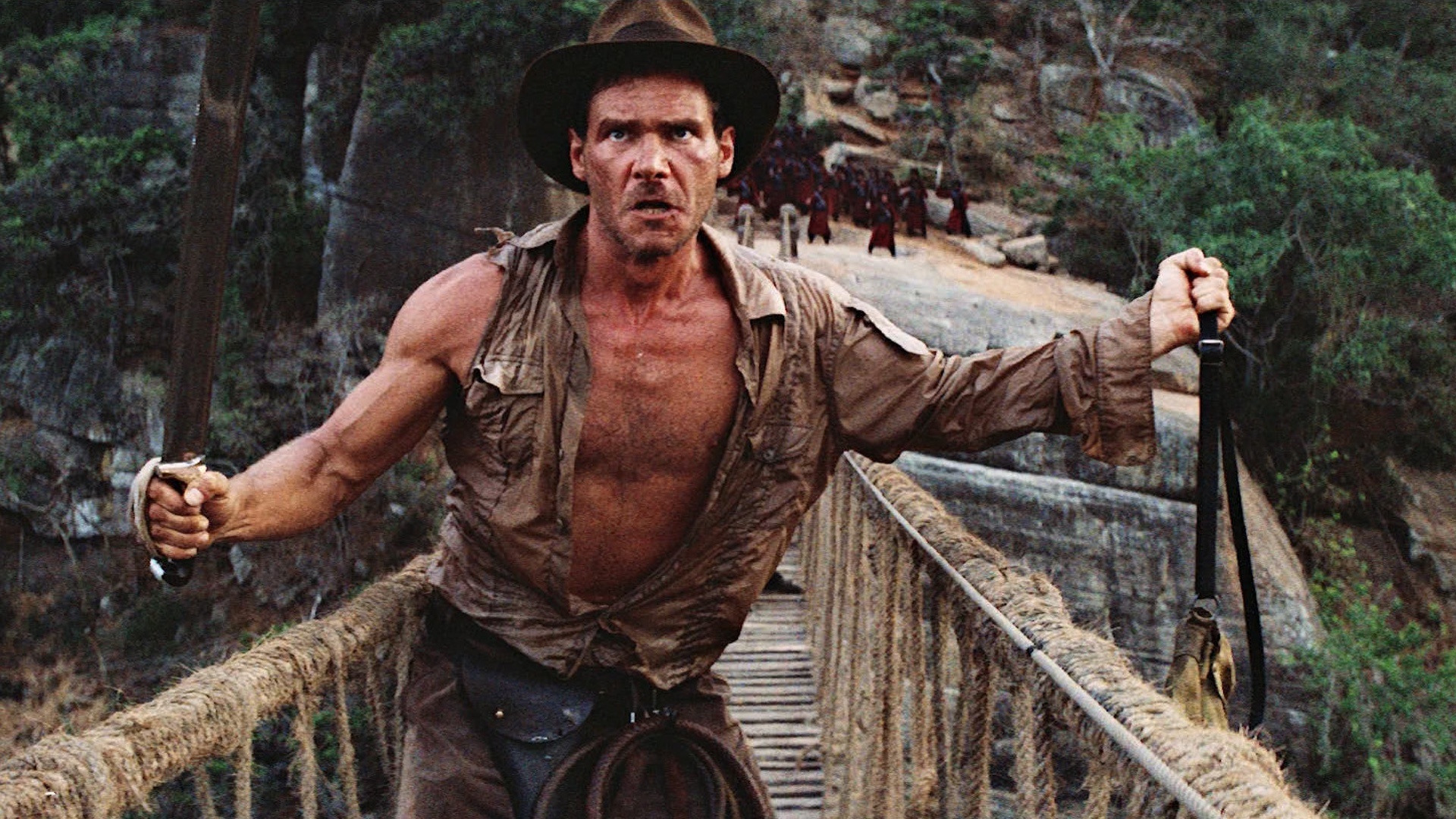Harrison Ford (Indiana Jones): The Kingdom of the Crystal Skull, Soviet agents kidnap American archeologist and his partner George "Mac" McHale. 1920x1080 Full HD Background.