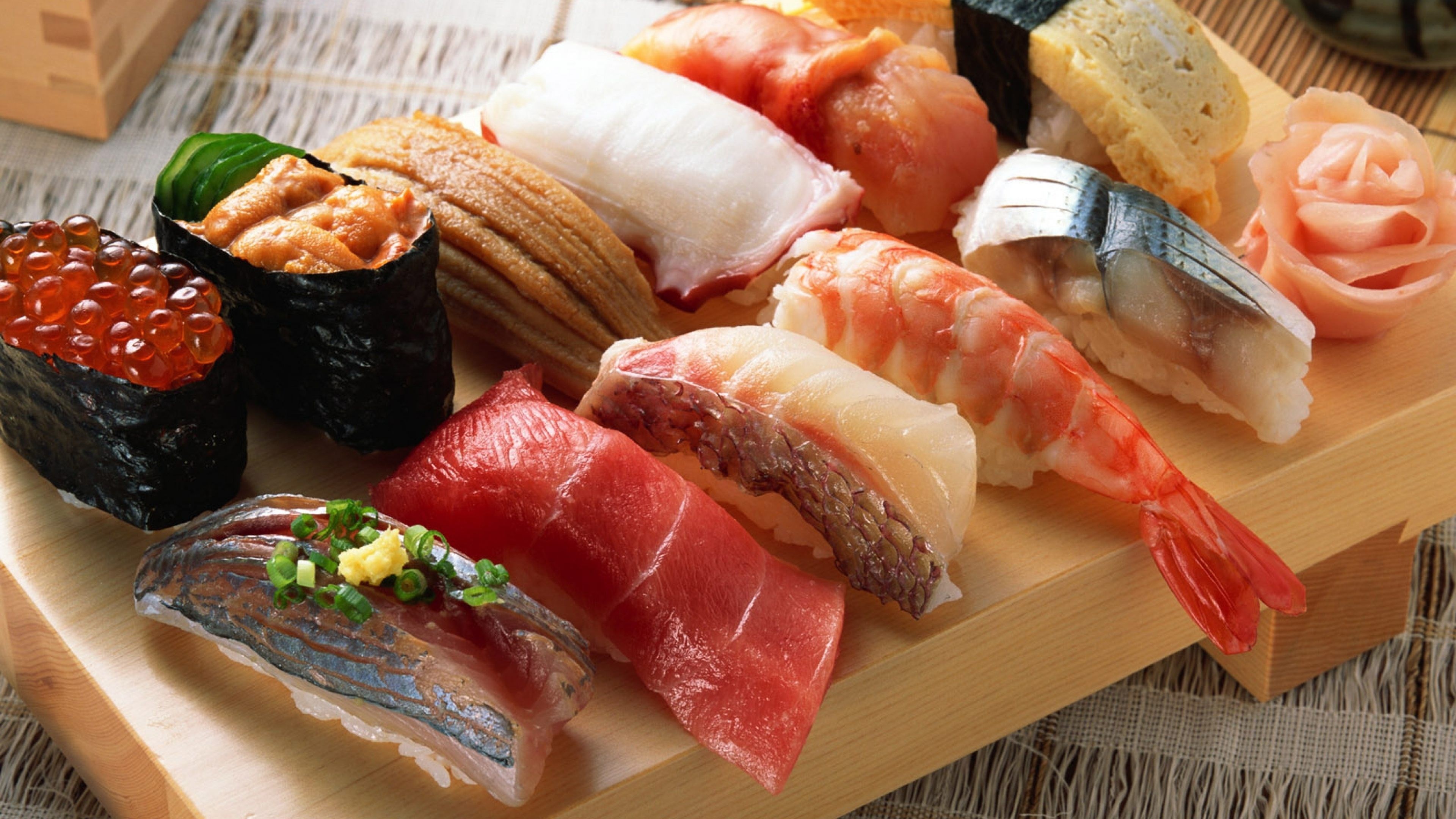 Sushi: A Japanese dish of prepared vinegared rice and fish, Seafood. 3840x2160 4K Wallpaper.