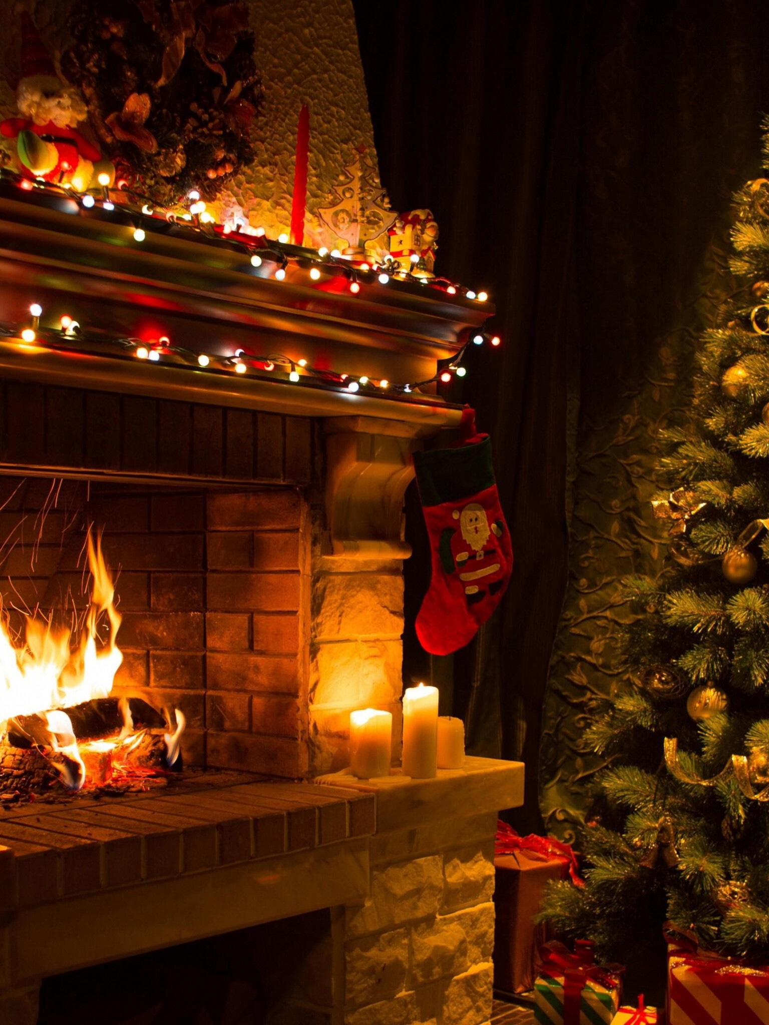 Christmas Fireplace: Holiday stockings, Candles, Fire. 1540x2050 HD Background.