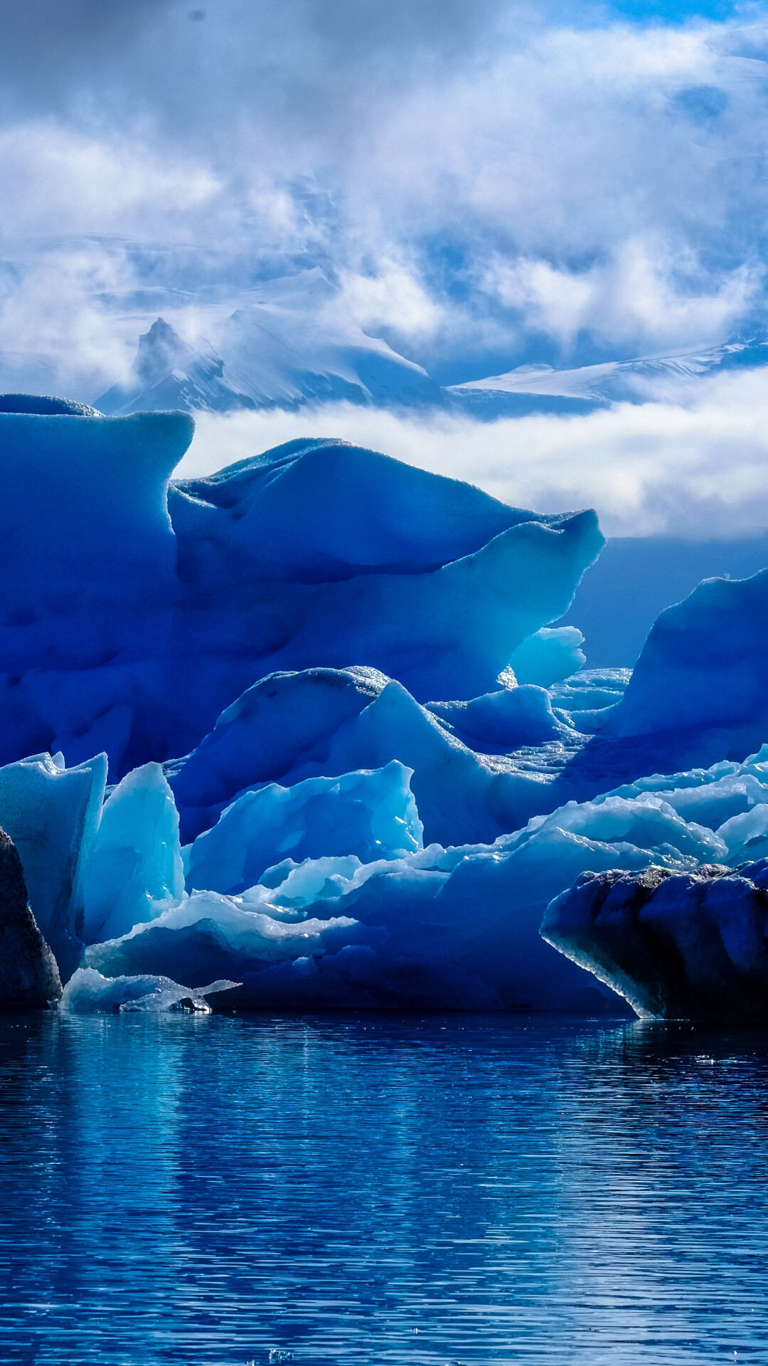 Glacier: Blue ice lagoon, Ice mass that forms only on land, The solid form of water. 1080x1920 Full HD Background.