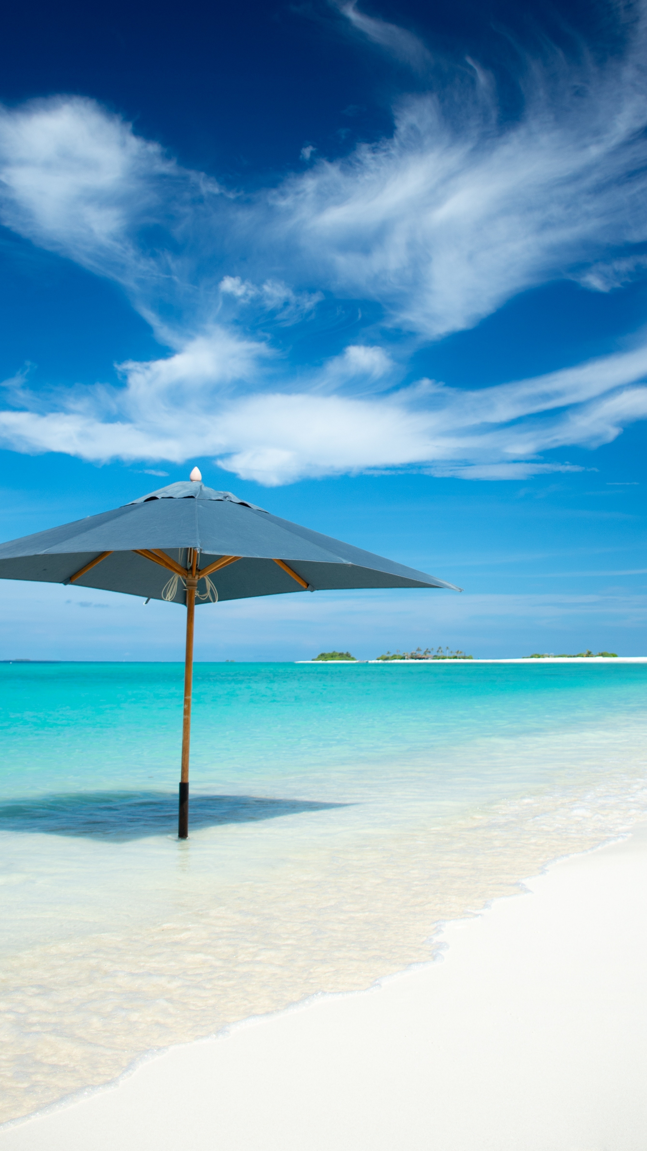 Beach Umbrella: Tropical island, Summer, A large sunshade, Coast, Sea. 2160x3840 4K Wallpaper.