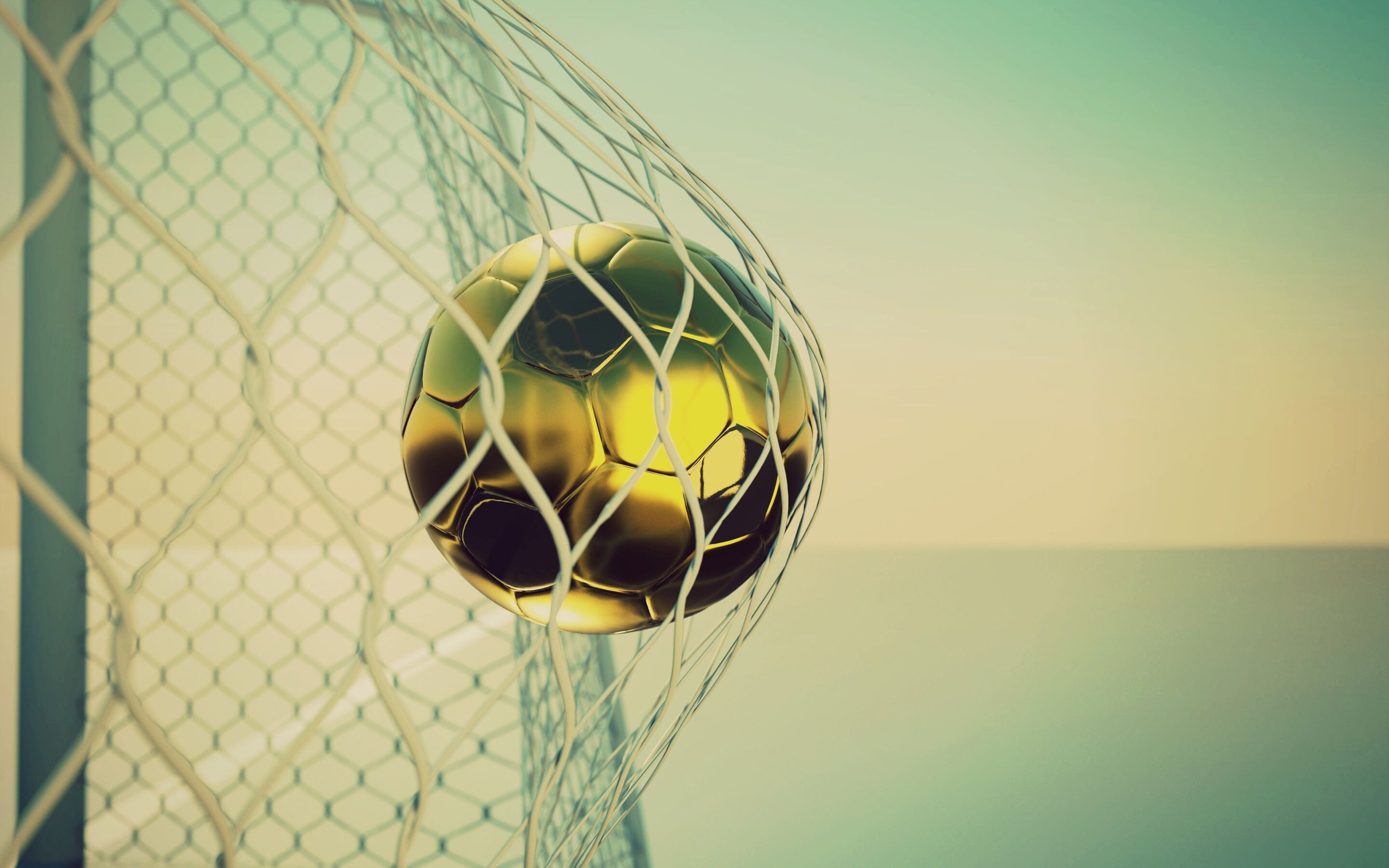 Goal (Sports): Football, Scoring a goal, The ball passing completely over the goal line between the goal posts. 2880x1800 HD Background.