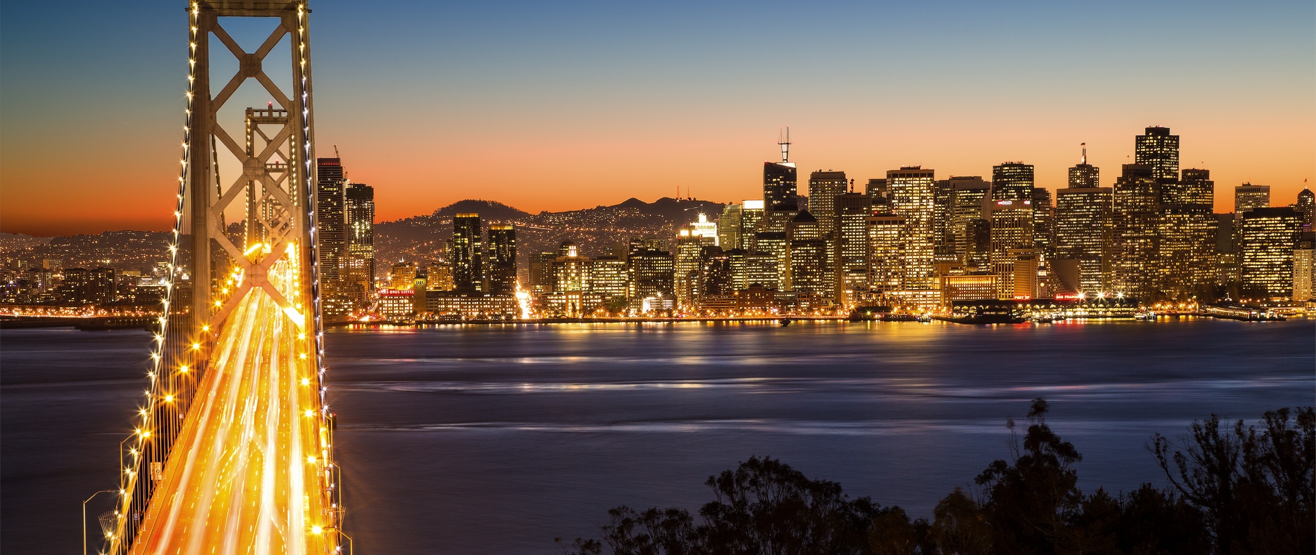 Oakland Skyline, Bay Bridge view, San Francisco cityscape, Night lights, 2560x1080 Dual Screen Desktop