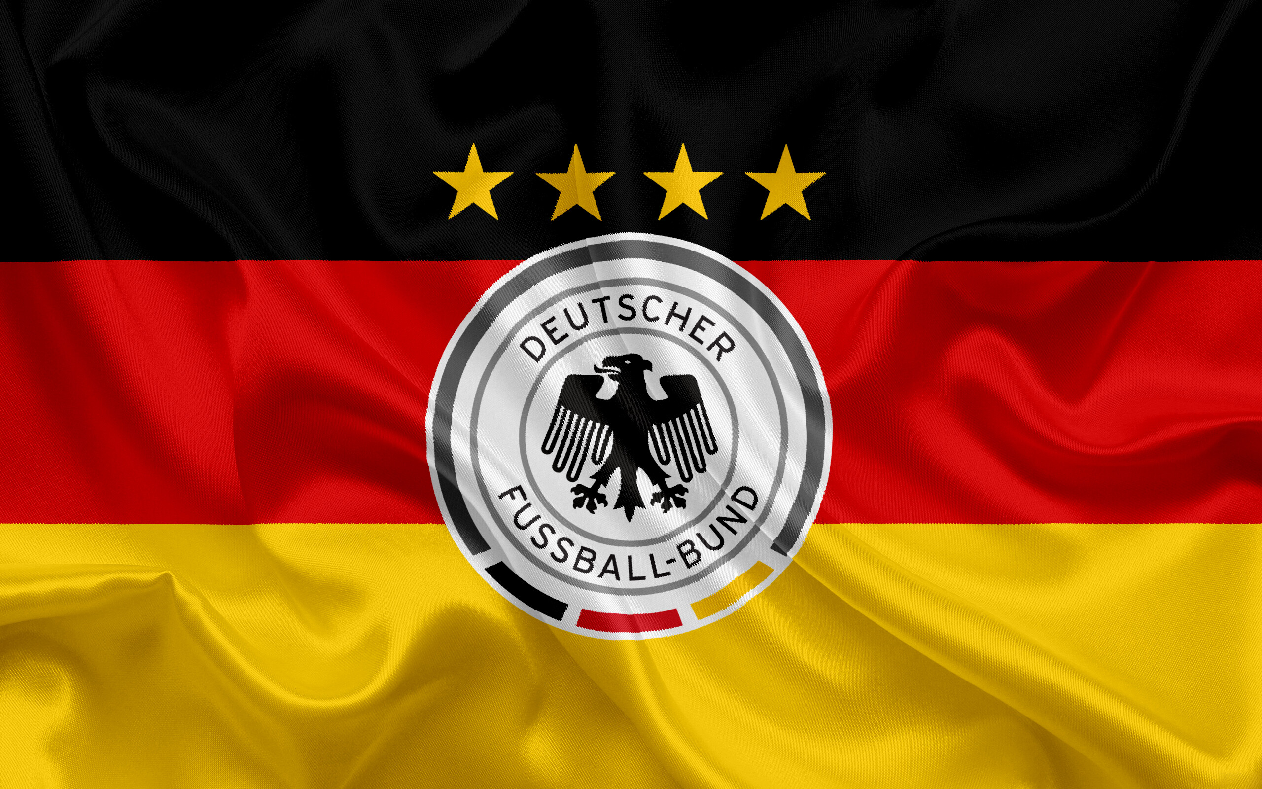 Germany National Football Team: DFB Eleven, Four-time World Cups champions, Three-time European Championships winners. 2560x1600 HD Background.