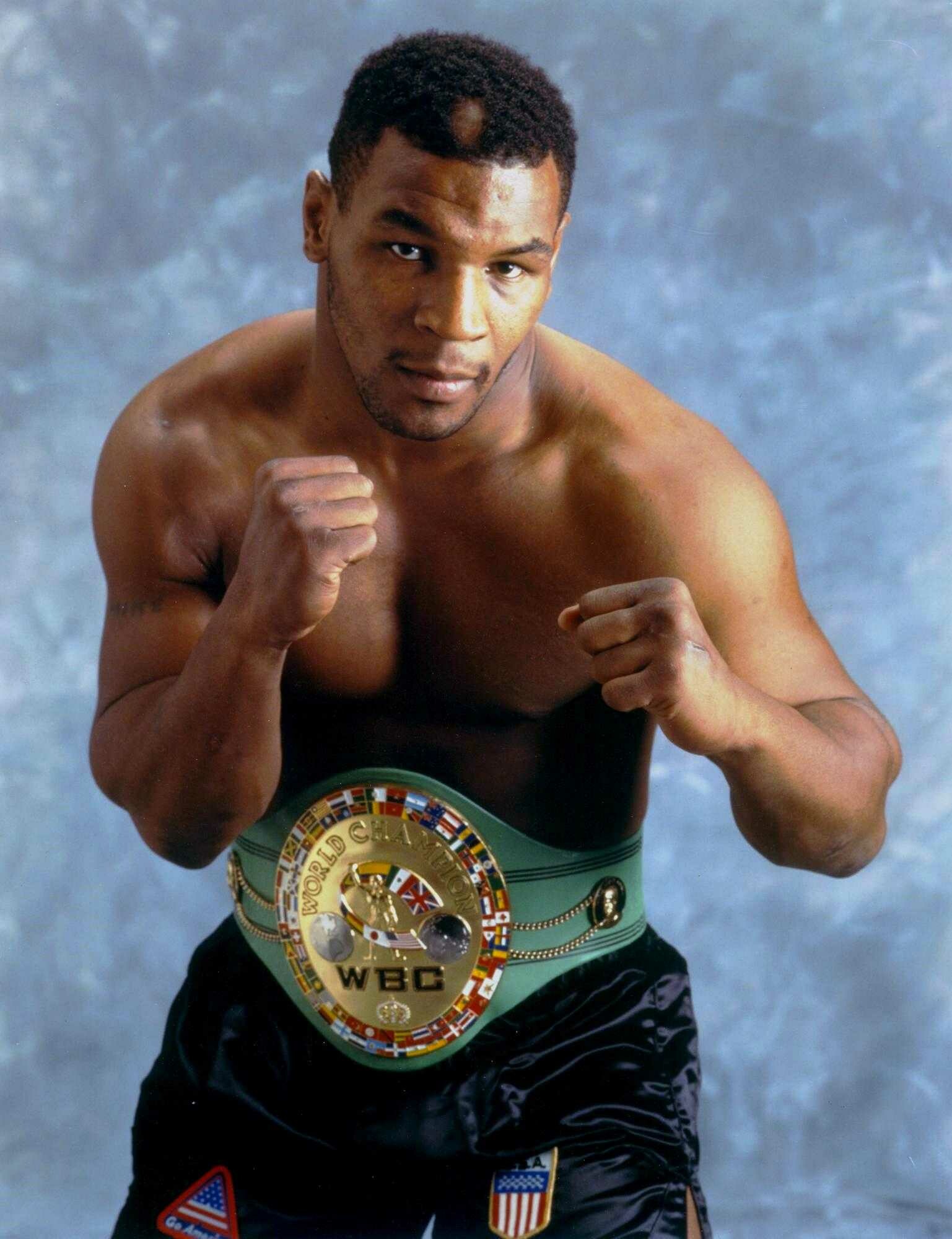 Mike Tyson: He took the International Boxing Federation (IBF) title from Tony Tucker on August 1, 1987. 1540x2000 HD Background.