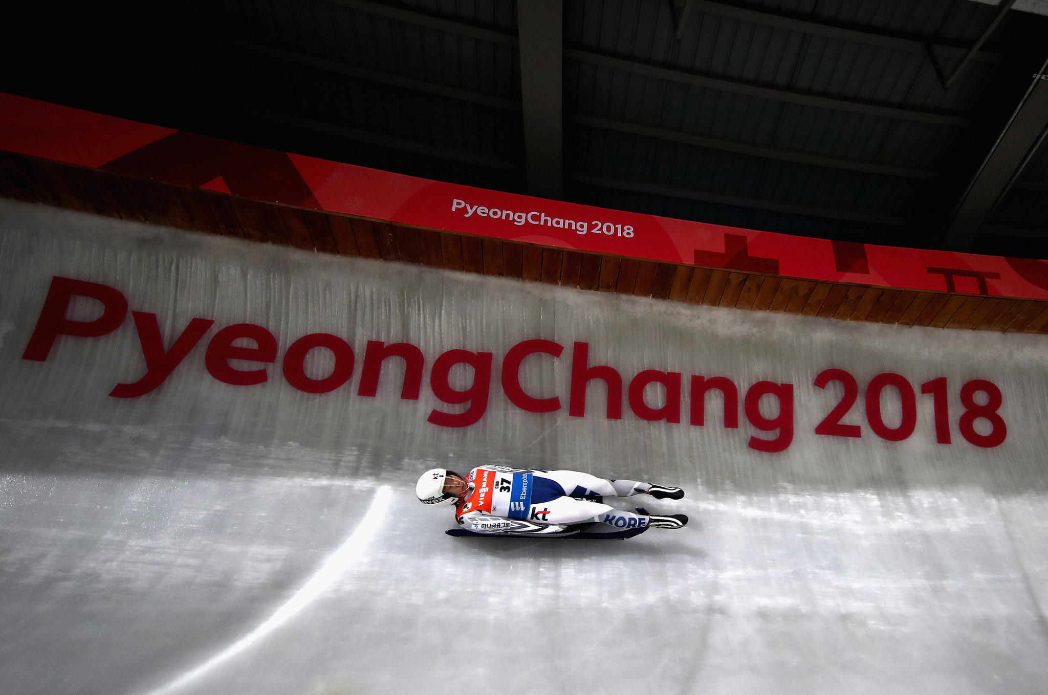Luge: A luger slides down the track at the 2018 PyeongChang Winter Olympics. 2050x1360 HD Background.