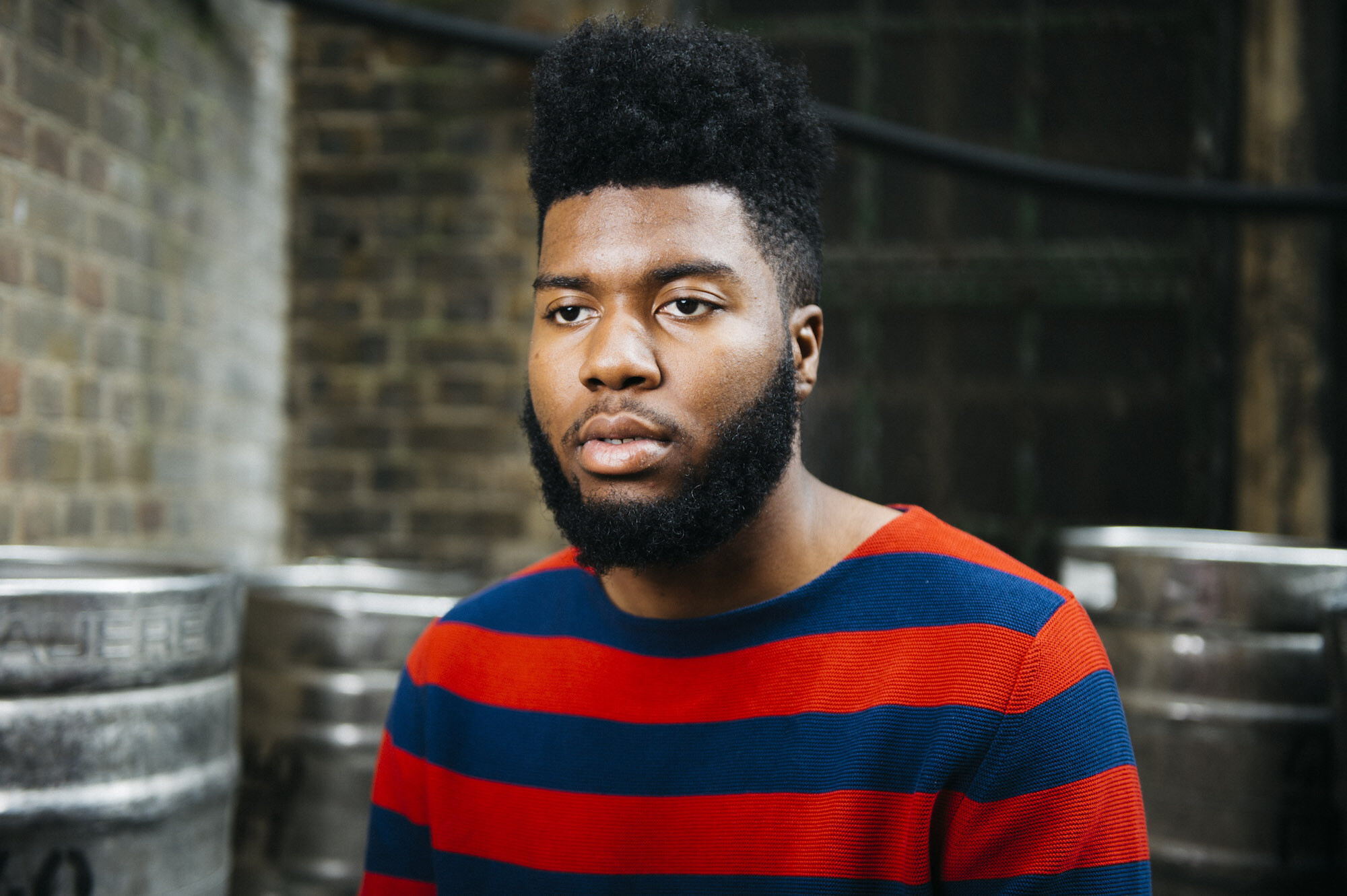 Khalid (Singer): Known for No. 1 pop songs "Love Lies" with Normani and "Eastside" with Benny Blanco and Halsey. 2000x1340 HD Background.