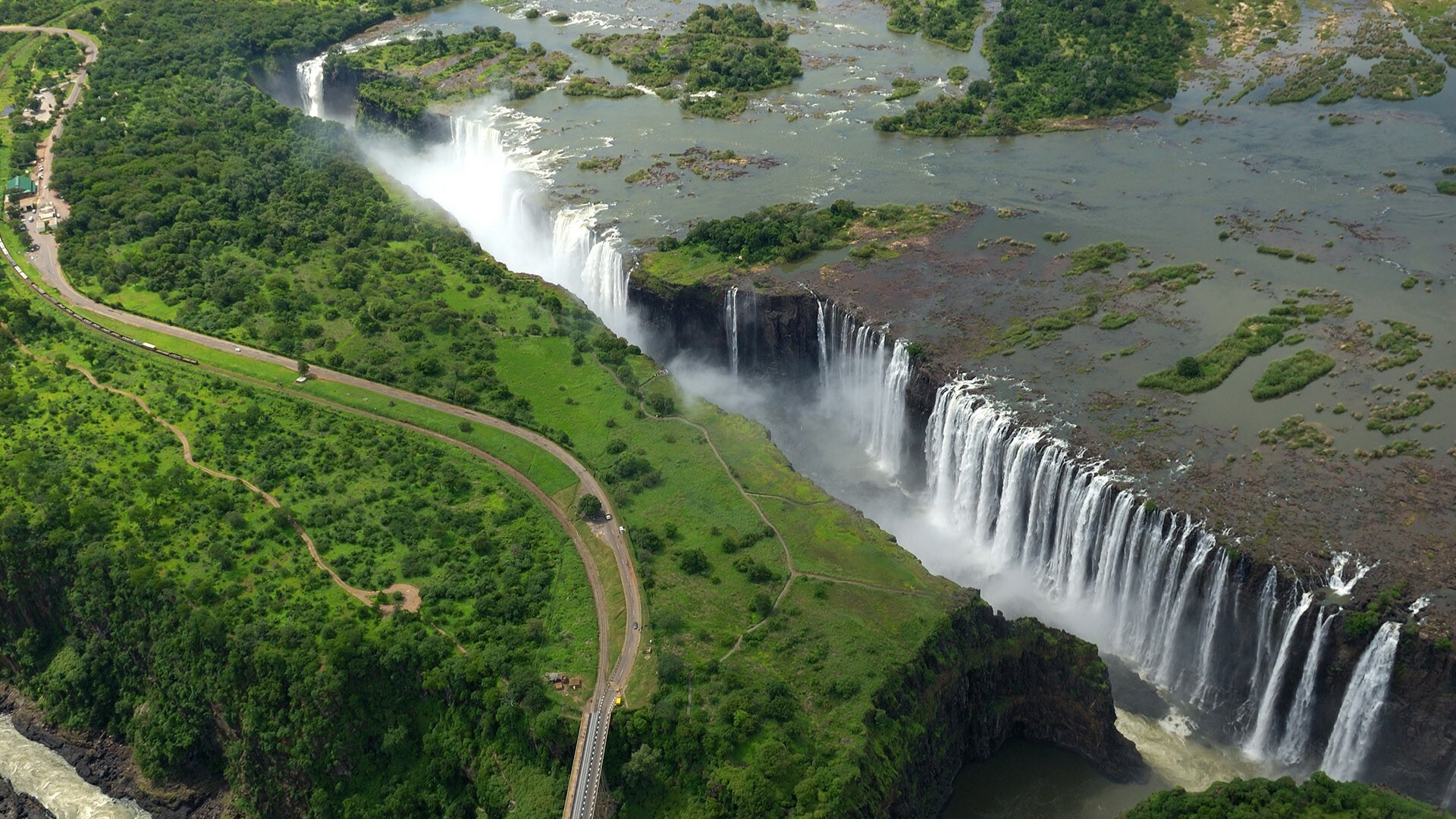 Victoria Falls: One of the Seven Natural Wonders of the World, Zambezi River, Africa. 1920x1080 Full HD Background.