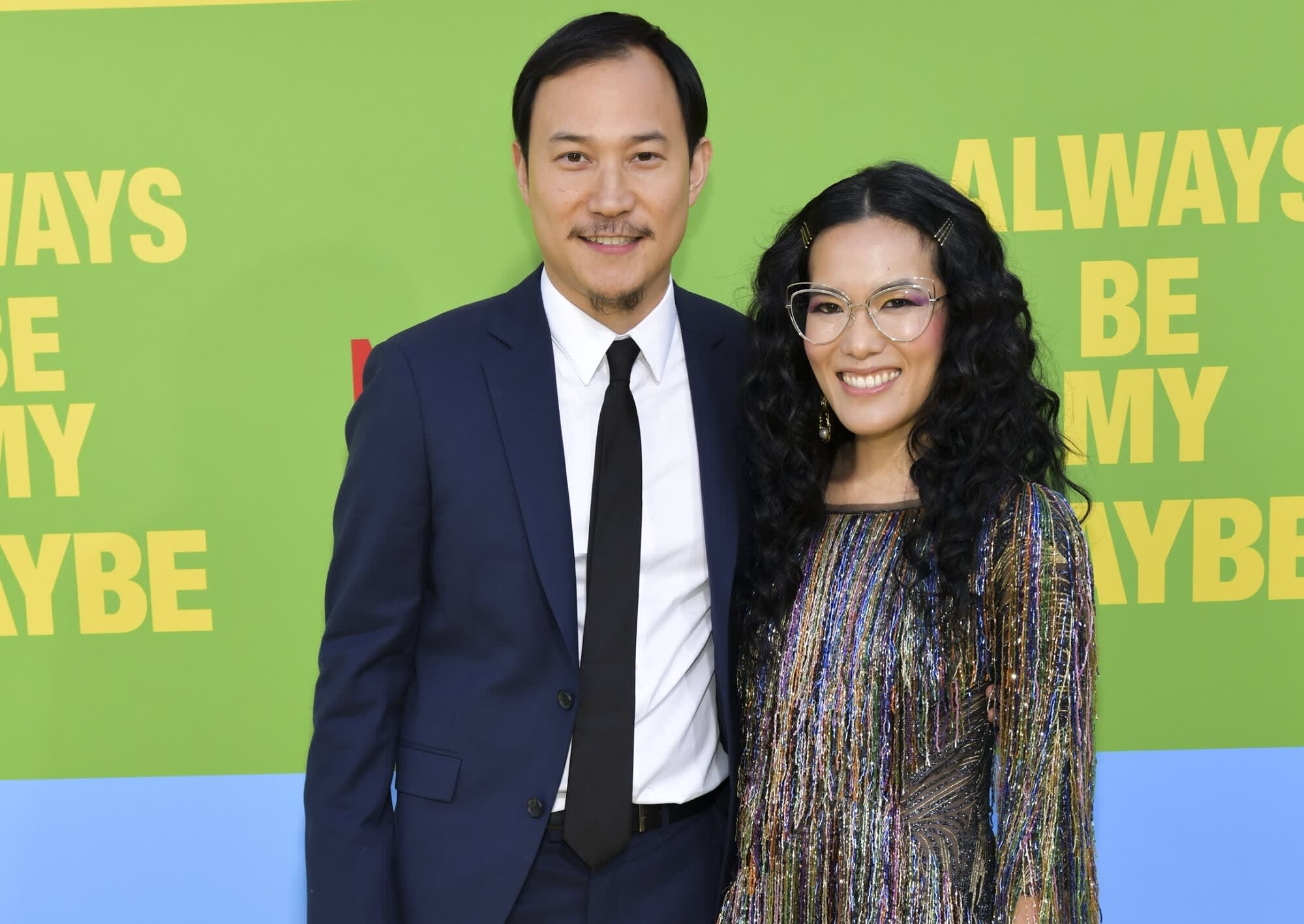 Ali Wong: Wong and her husband Justin Hakuta, Ending the marriage, The couple. 2000x1420 HD Background.
