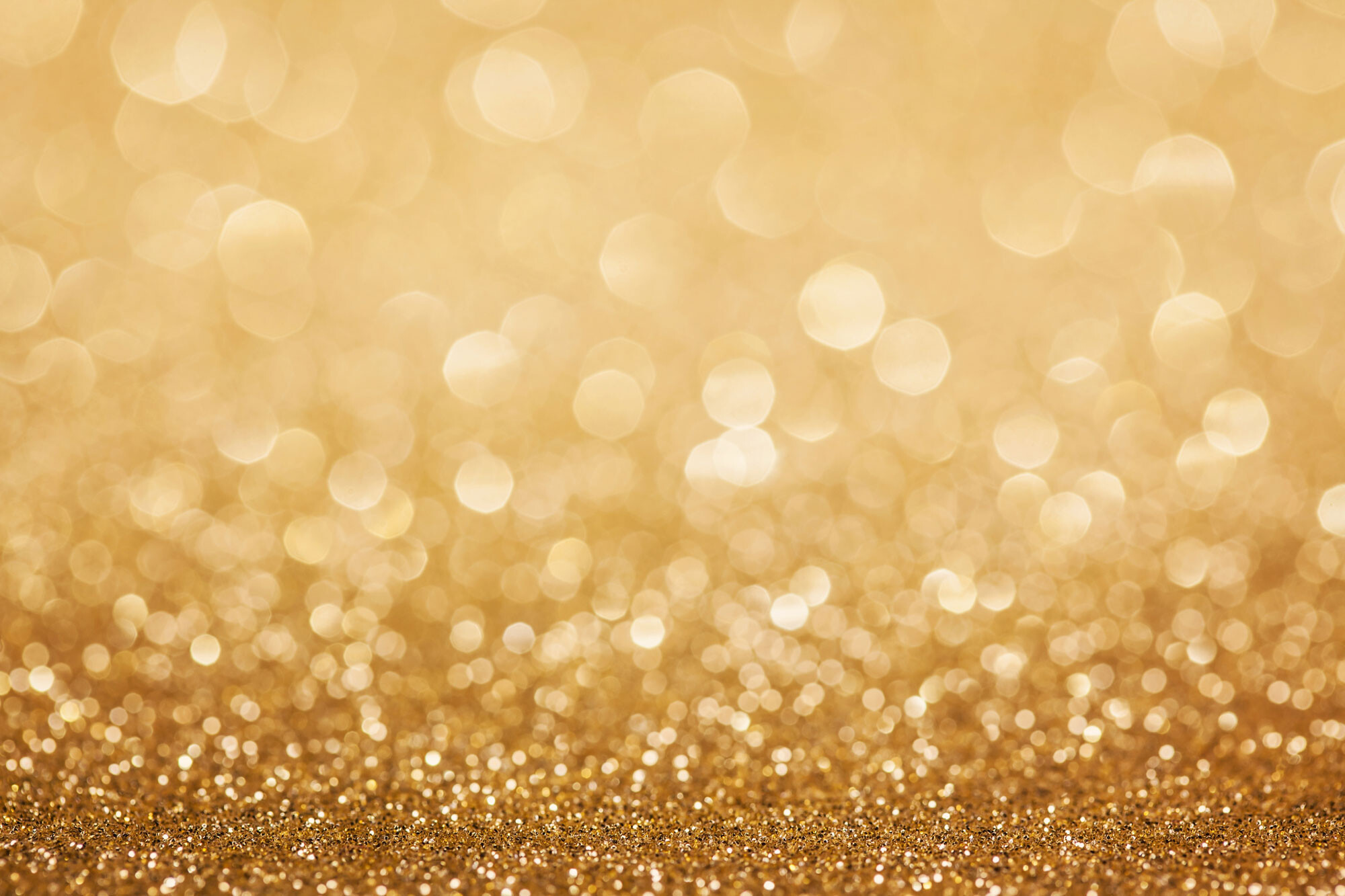 Gold Glitter: An assortment of small, reflective particles that come in a variety of shapes, sizes, and colors. 2000x1340 HD Wallpaper.