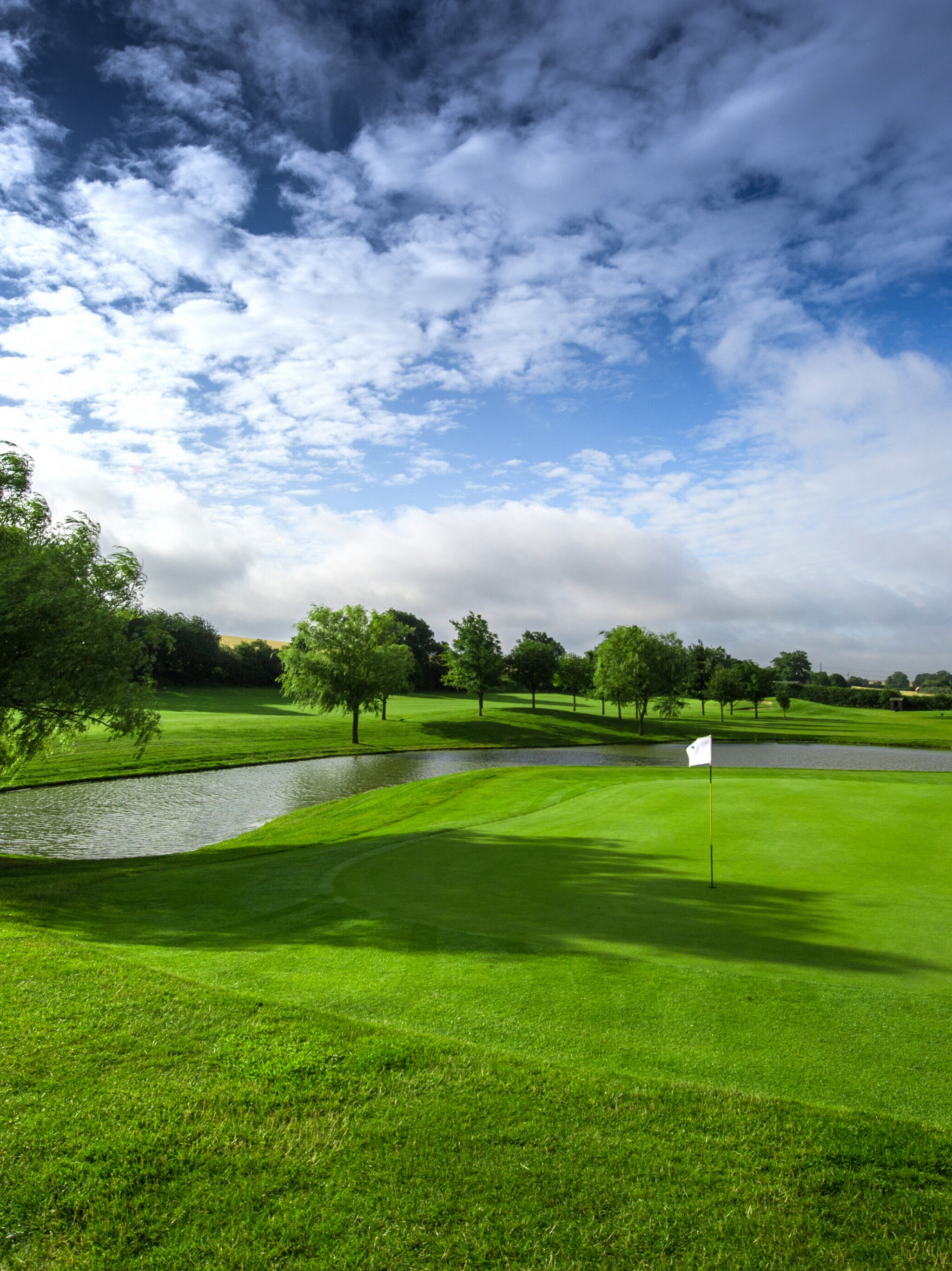 Golf: Water hazards, Natural obstacles designed to add both beauty and difficulty to a course. 2050x2740 HD Background.