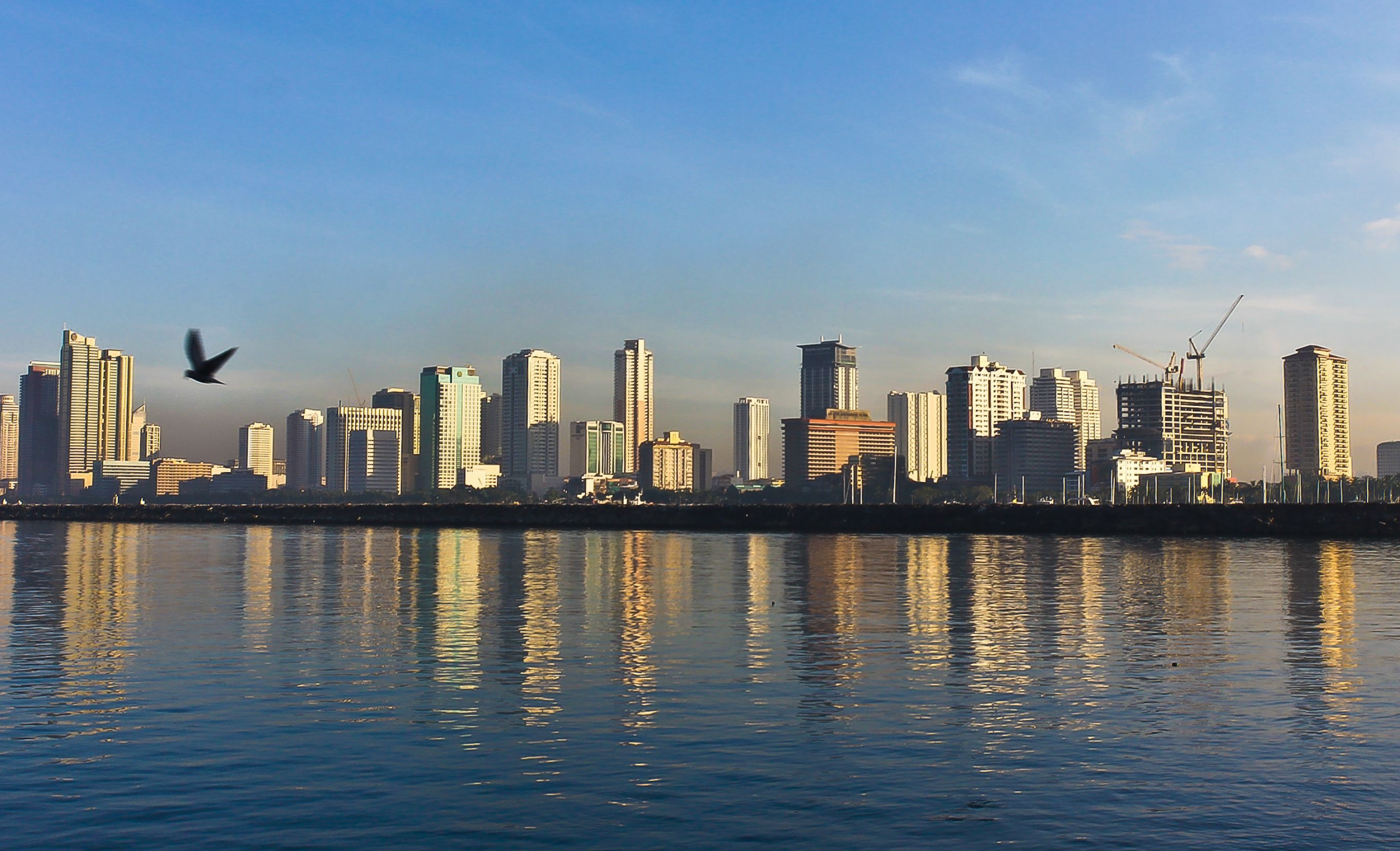 Manila Skyline, Harbor views, Skyscrapers in the background, Cityscape photography, 3000x1830 HD Desktop