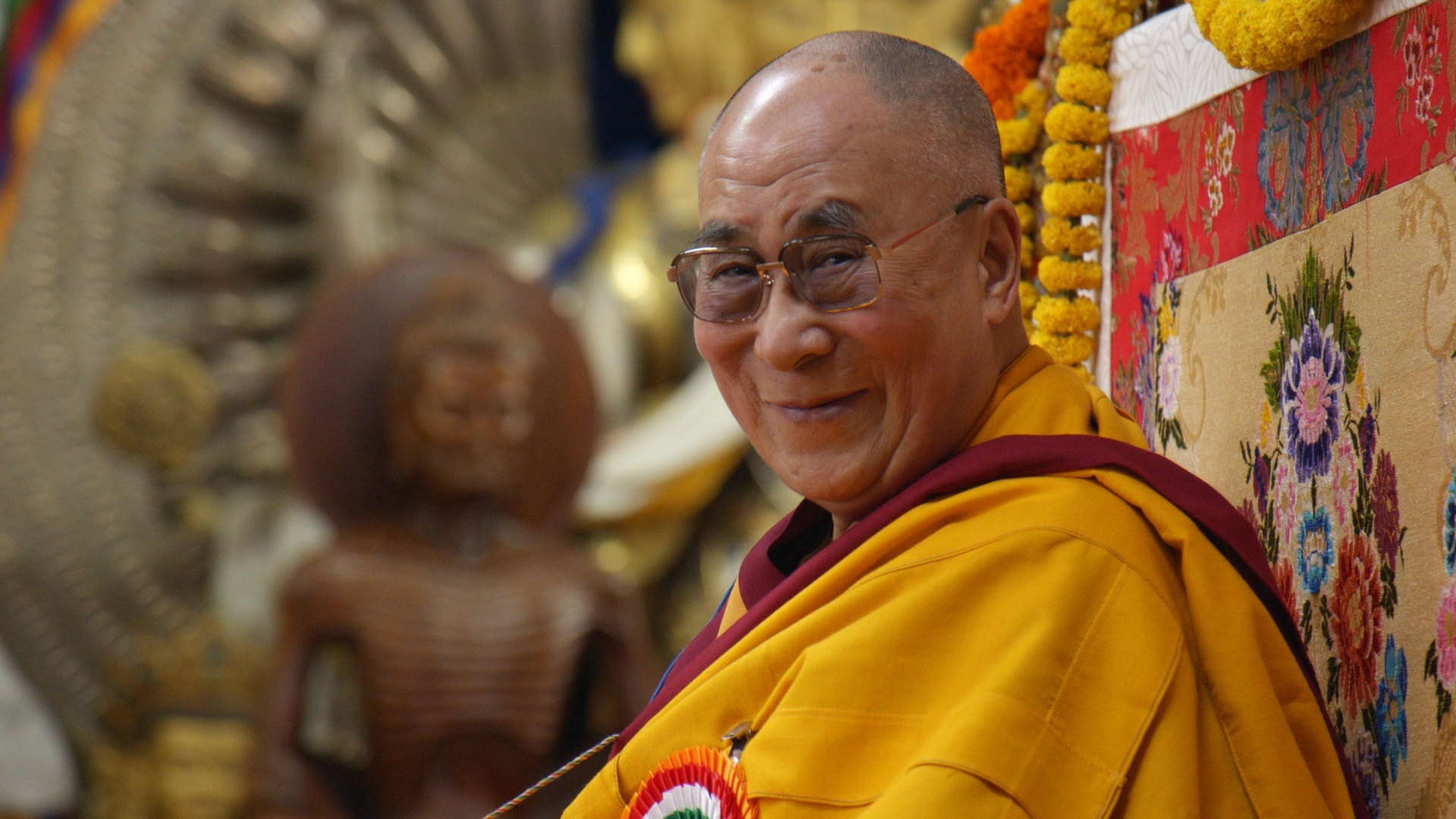 Dalai Lama: The author of "The Art of Happiness" and "Beyond Religion: Ethics for a Whole World". 1920x1080 Full HD Background.