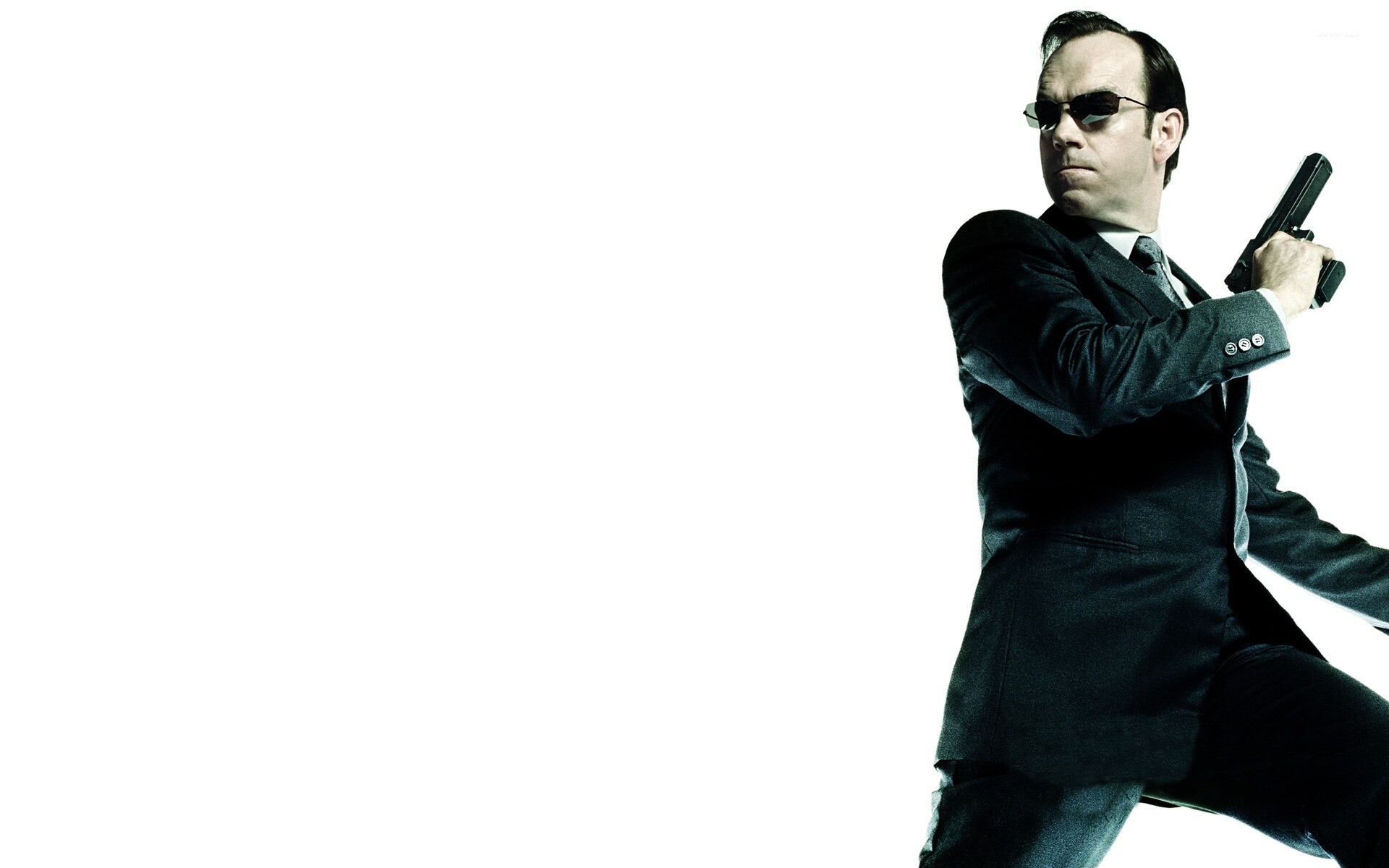 Matrix Franchise: Agent Smith, Primarily portrayed by Hugo Weaving in the first trilogy of films. 1920x1200 HD Wallpaper.